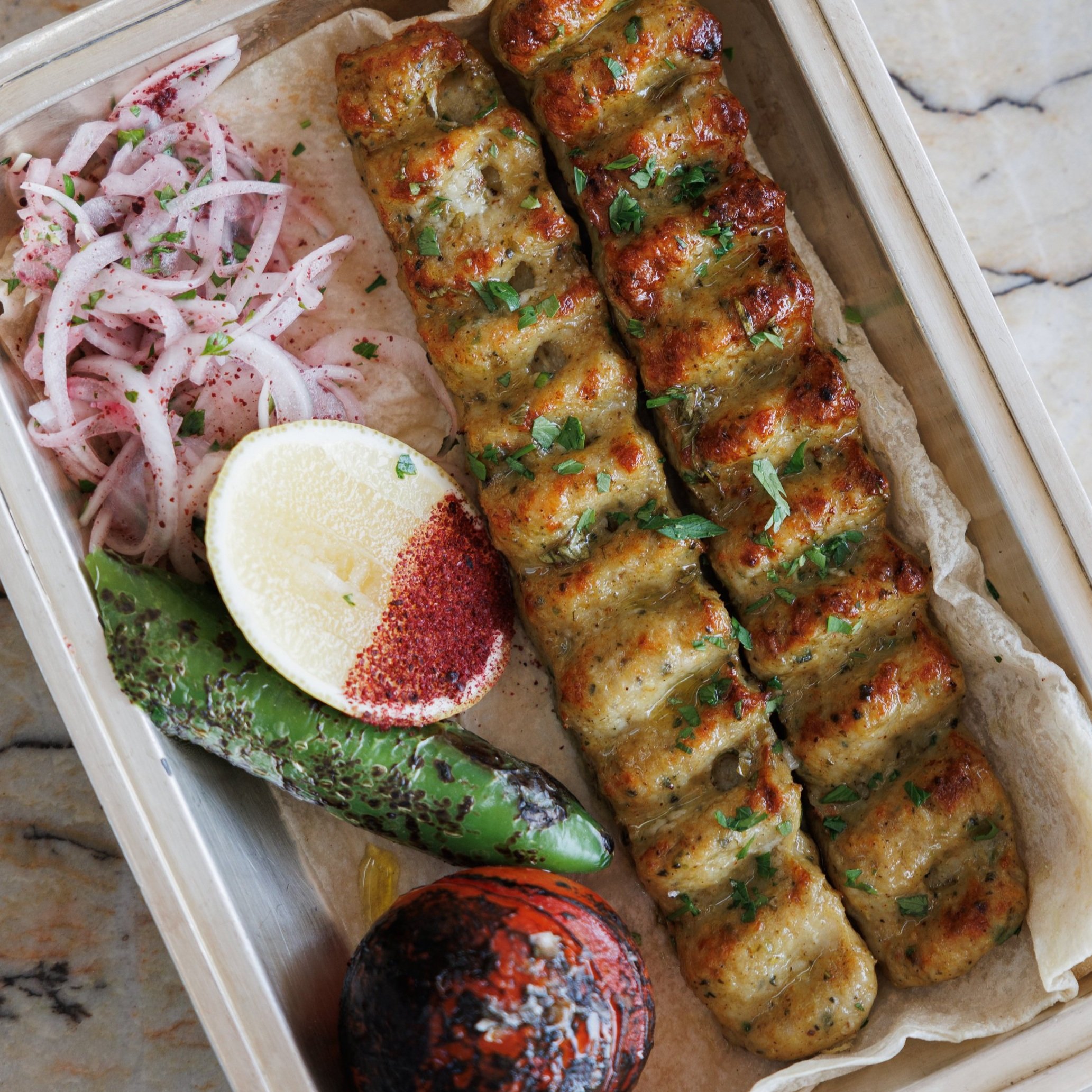 Chicken Koobideh / green pepper, garlic & fresh herbs / 79 AED