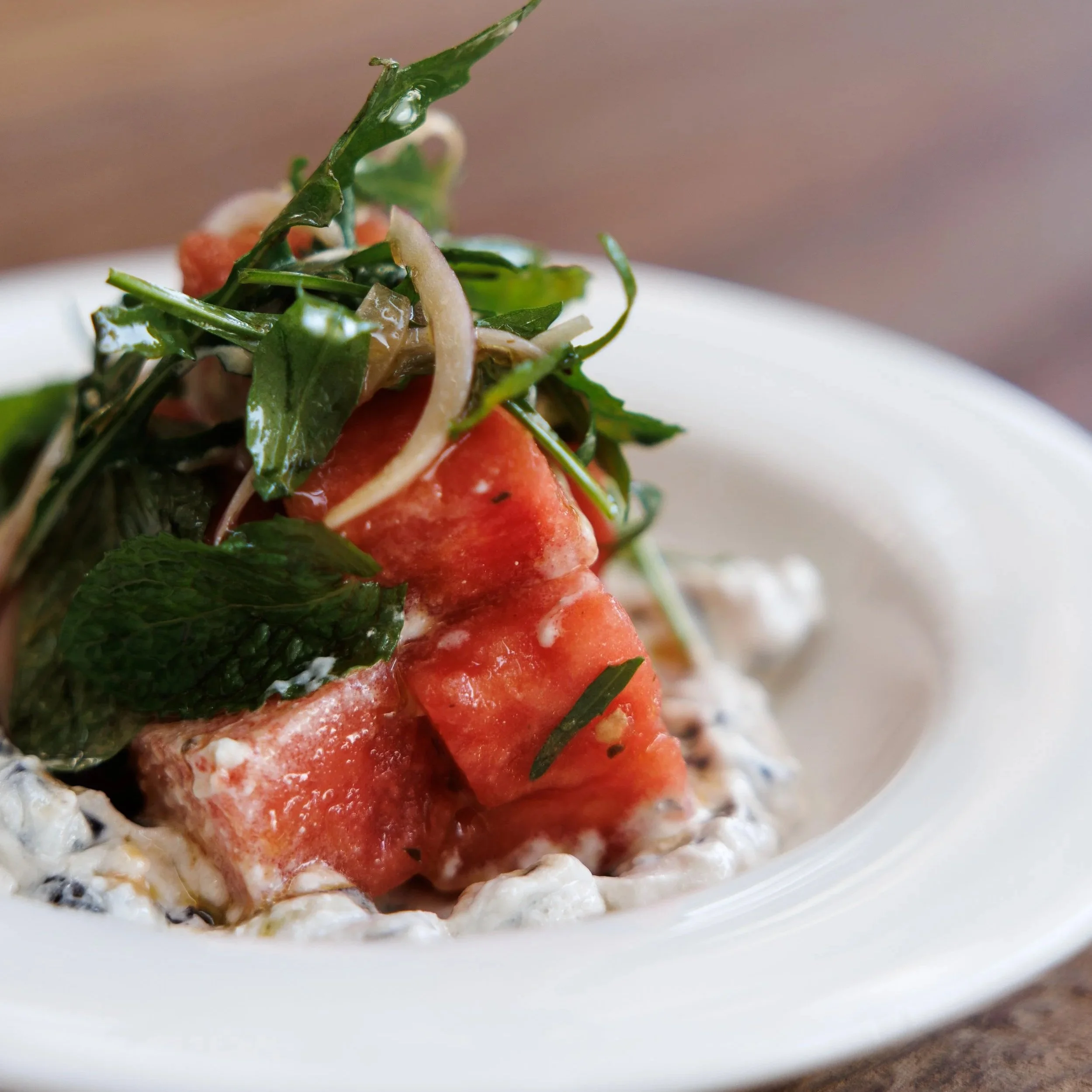 Watermelon Salad / olive labneh, red onion, date & orange blossom dressing / 42 AED