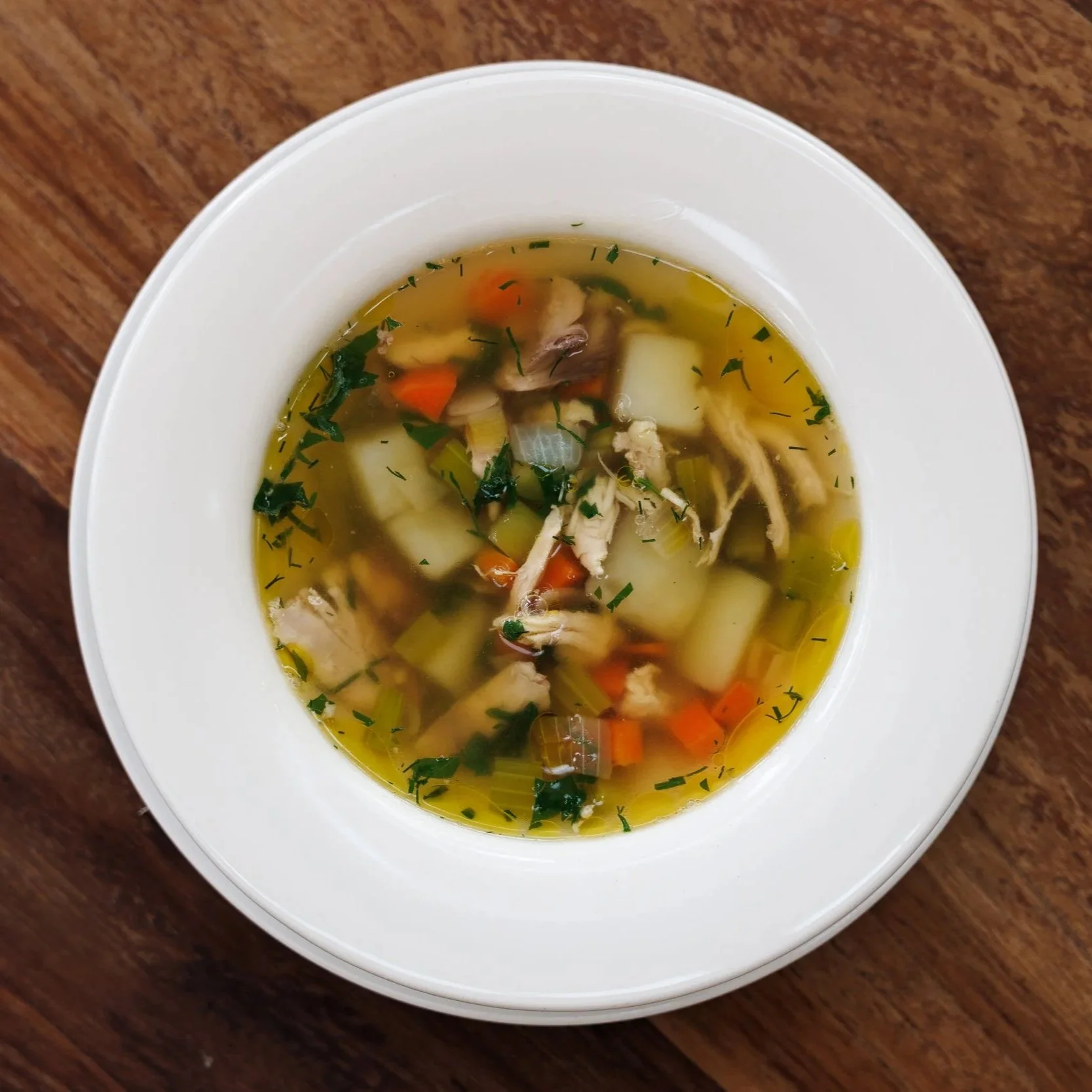Consommé-ye Morgh / rich chicken broth, parsley, dill, root vegetables / 39 AED