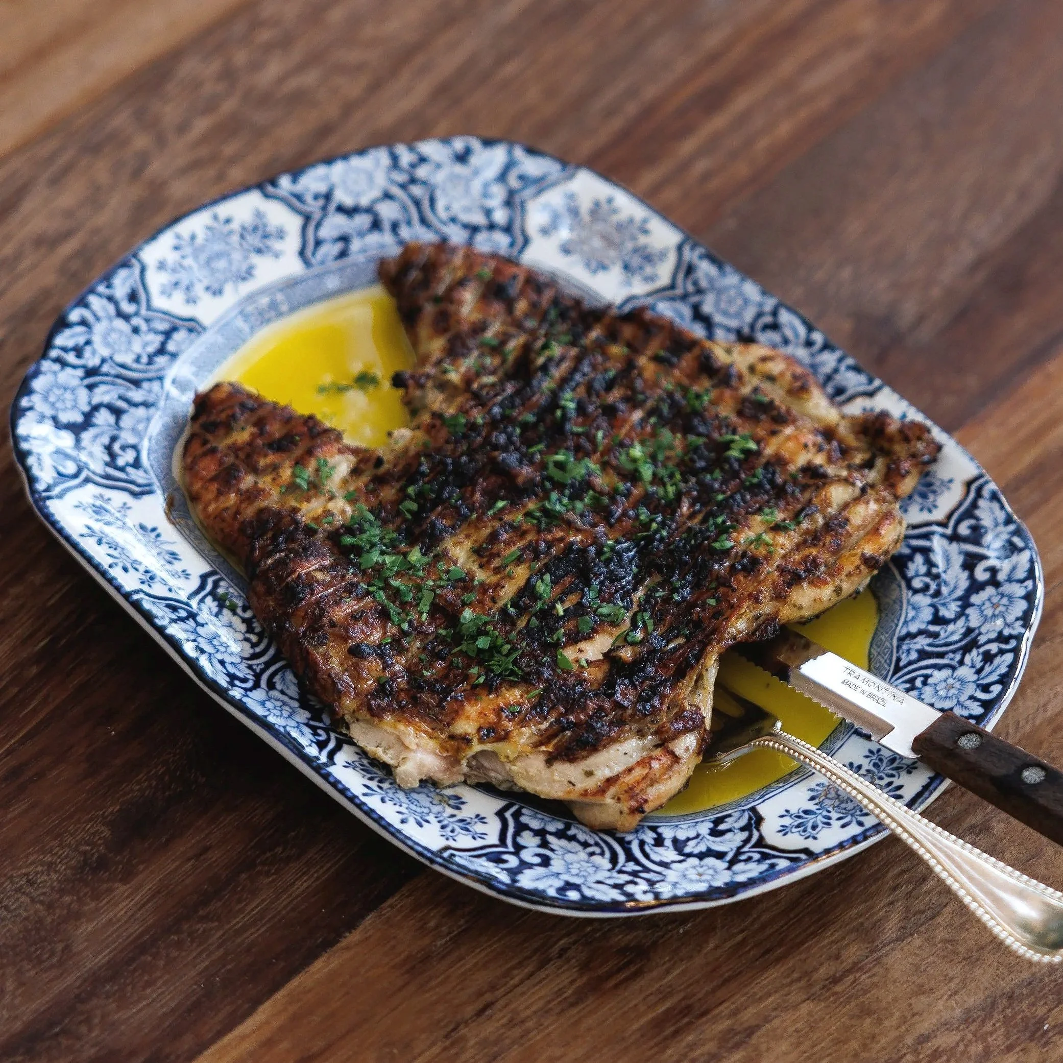 Baby Saffron Chicken / deboned chicken, lemon sauce & laban glaze / 110 AED