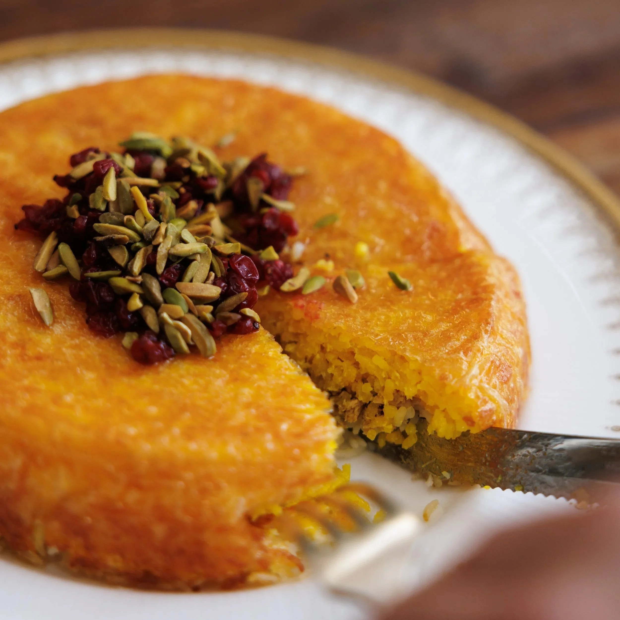Chicken Tahchin / saffron baked chicken rice, barberries & pistachio / 69 AED