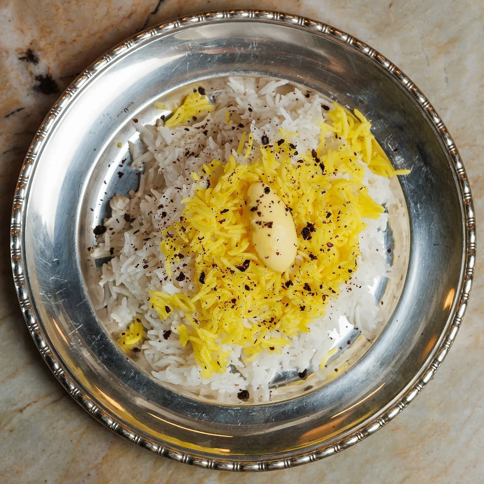 House Rice / white & saffron rice, whipped butter / 26 AED