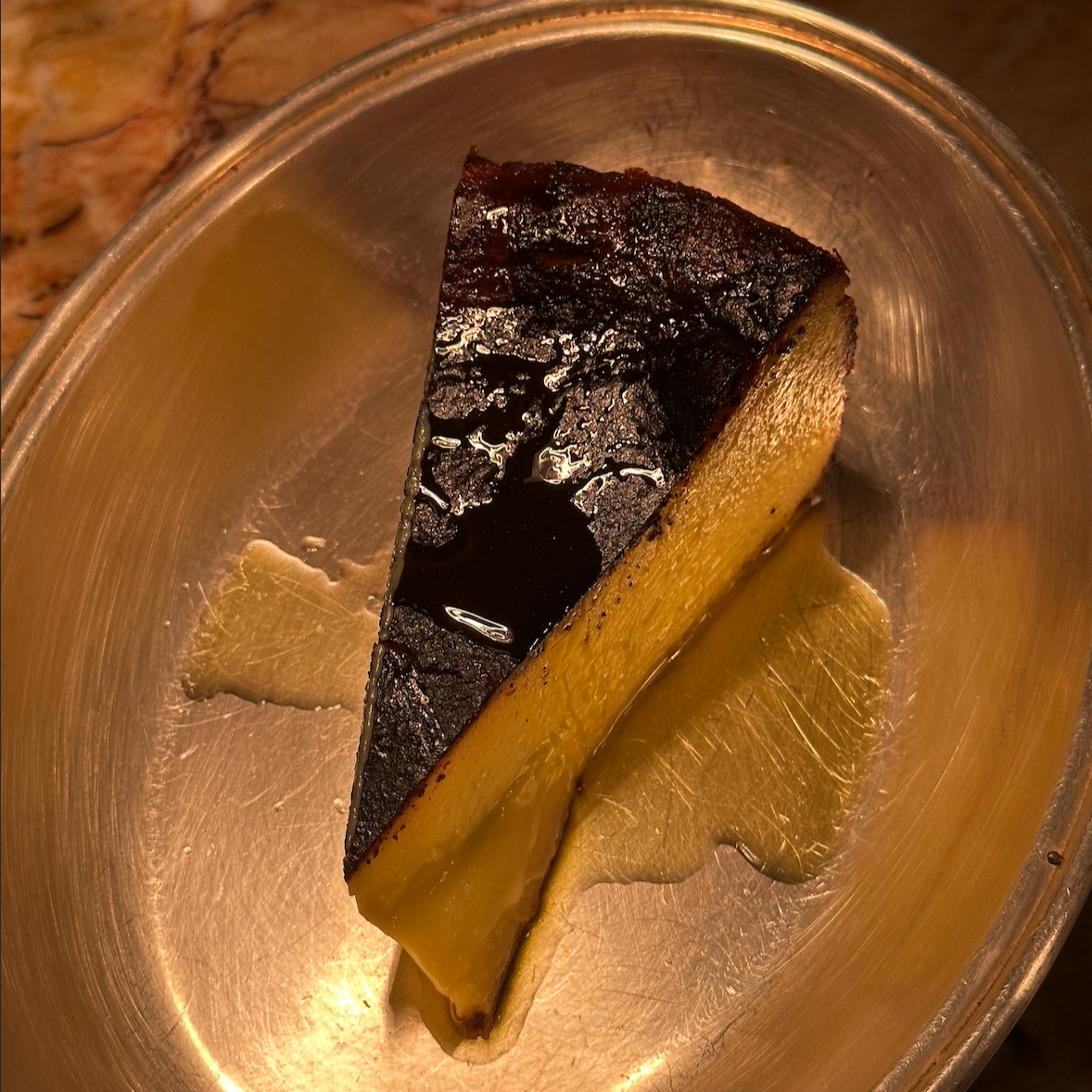 Olive oil cheesecake / caramelised olive oil cheesecake with olive oil cream / AED 53