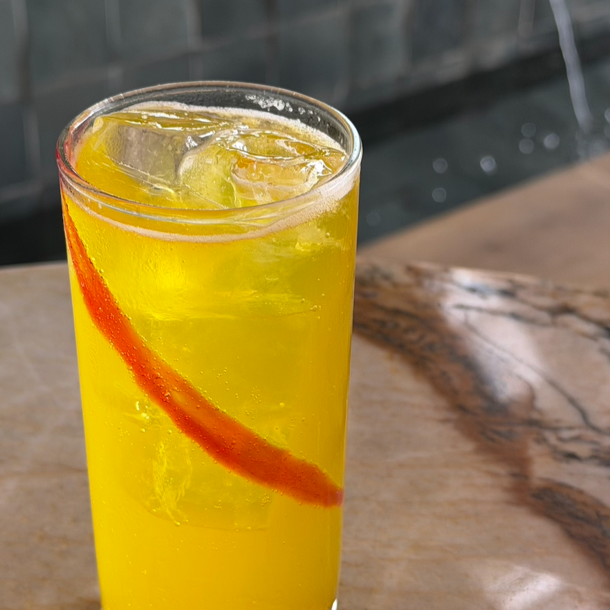 Persian Lemonade / Golden saffron mix with lemon and sparkling water / 32 AED
