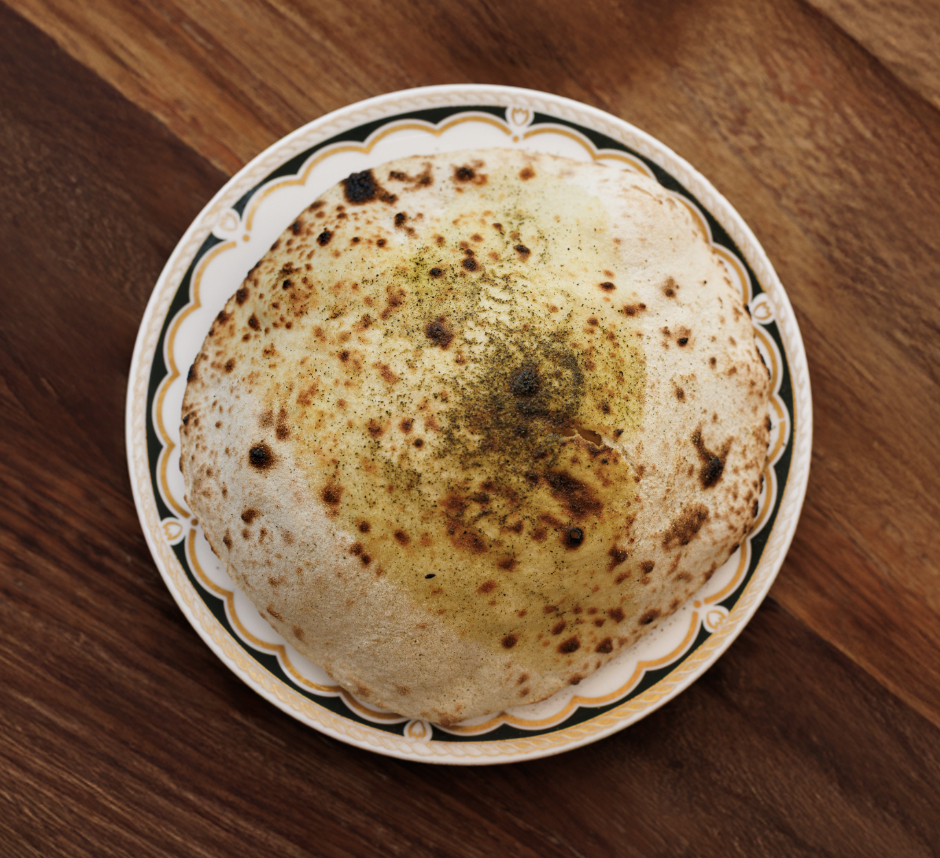 House Flatbread / signature sourdough woodfired bread / 12 AED