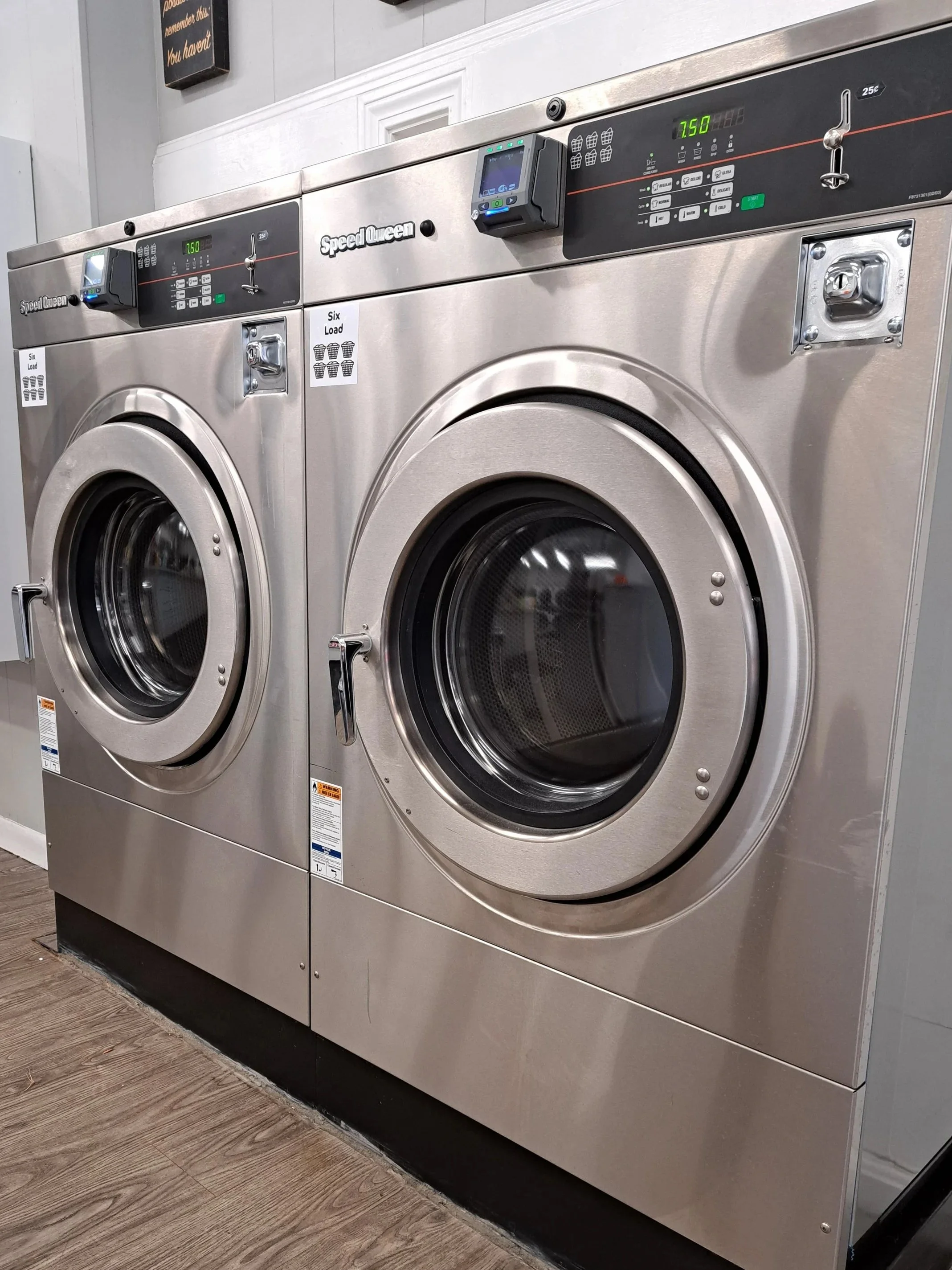 Commercial washing machines in a laundromat, Salem NH