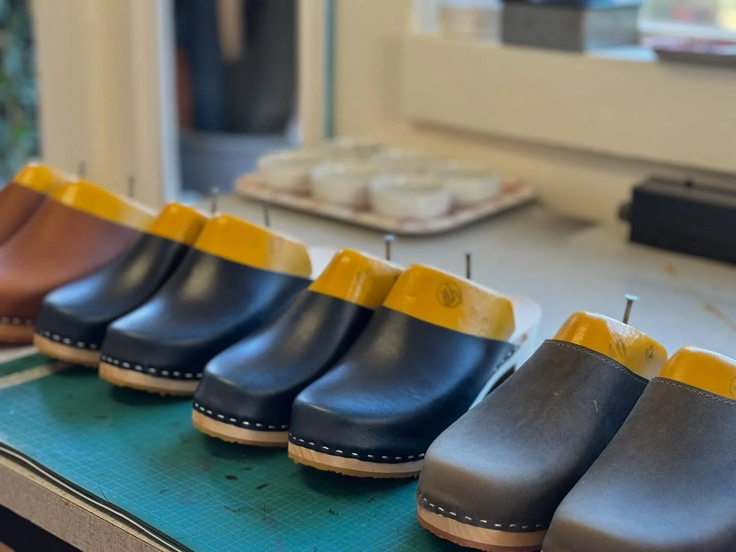 A fresh batch of Hello Clogs taking shape in the studio &mdash; each pair built by hand, one at a time.

There&rsquo;s something deeply satisfying about this part of the process &mdash; the rows of nearly finished shoes lined up, waiting to carry som