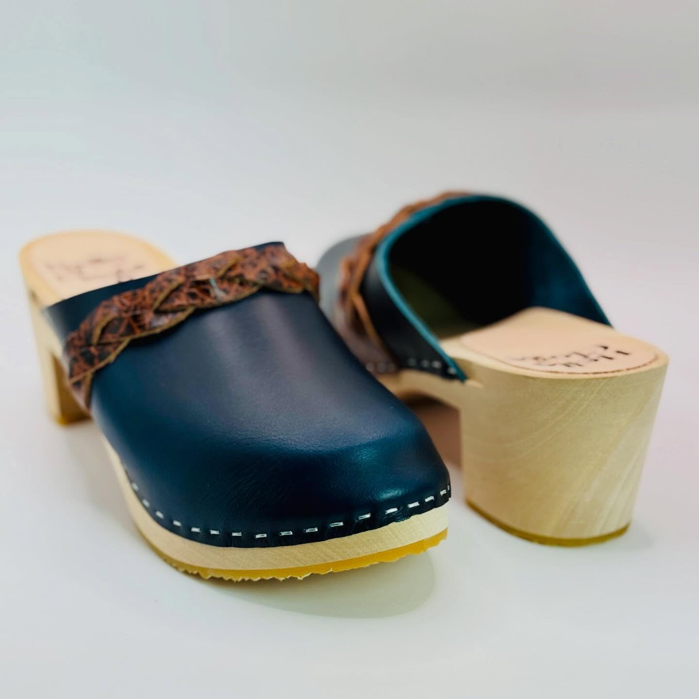 New in the online boutique 💙

The Marigold in Indigo with Cognac Crackle Braid &mdash; an easy slip-on with a lower cut, made to wear beautifully over time.
Handmade in Northern California, one of a kind.

Size 38
Available now at helloclogs.com