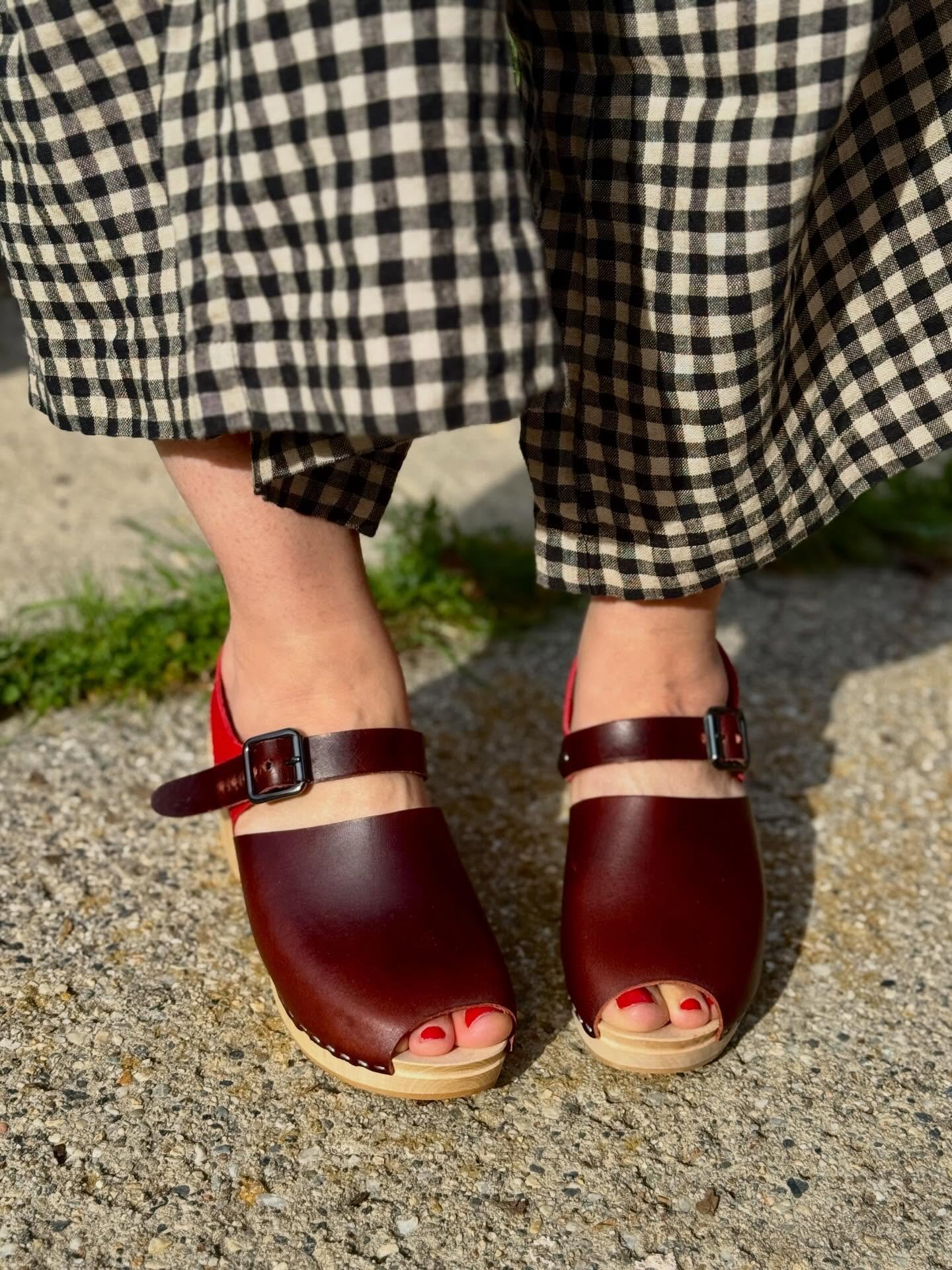 New in the Ready-to-Ship Boutique. 
The Azalea clog in Wine &amp; Cherry, size 37&mdash;a refined open-toe silhouette in rich, saturated leather, finished with a clean ankle strap. Slow made, ready to wear. ❤️