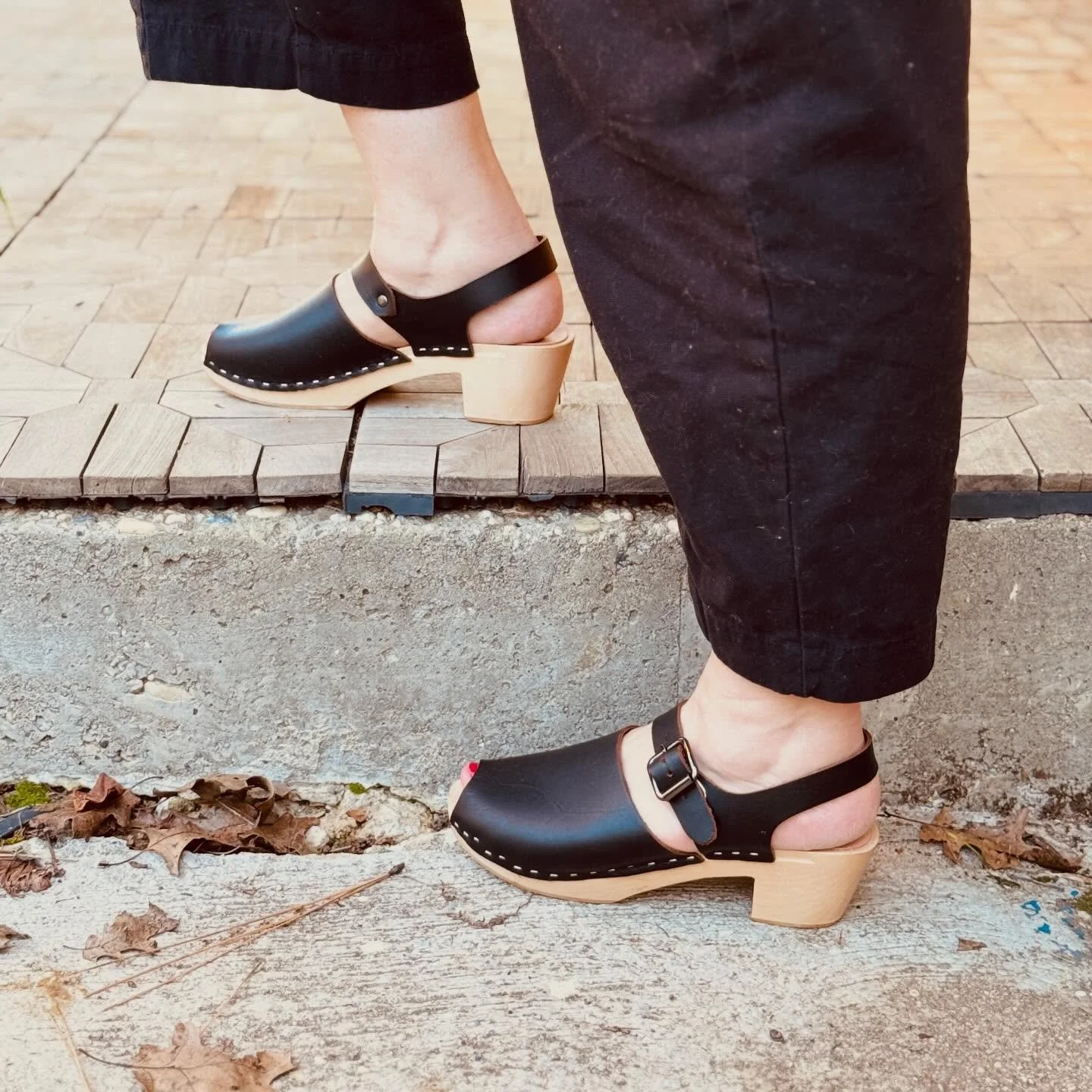 The Azalea &mdash; an open-toe slingback clog with an easy, flattering shape. Light, versatile, and made for warm days and easy evenings.

Handcrafted in small batches with premium leather and sustainably sourced wood.
Available now in the online bou