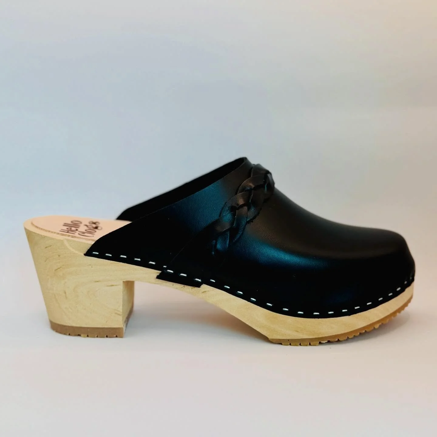 Classic black never misses. 🖤

The Poppy in Black is bold, clean, and endlessly wearable&mdash;finished with our signature braided detail and high tapered heel.

Handmade in Northern California.
Size 42
Available now at helloclogs.com

#helloclogs #