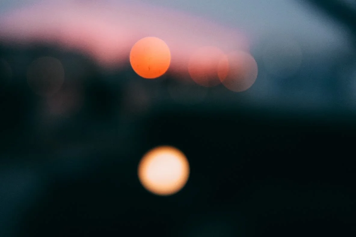 Defocused lights with bokeh effect at sunset