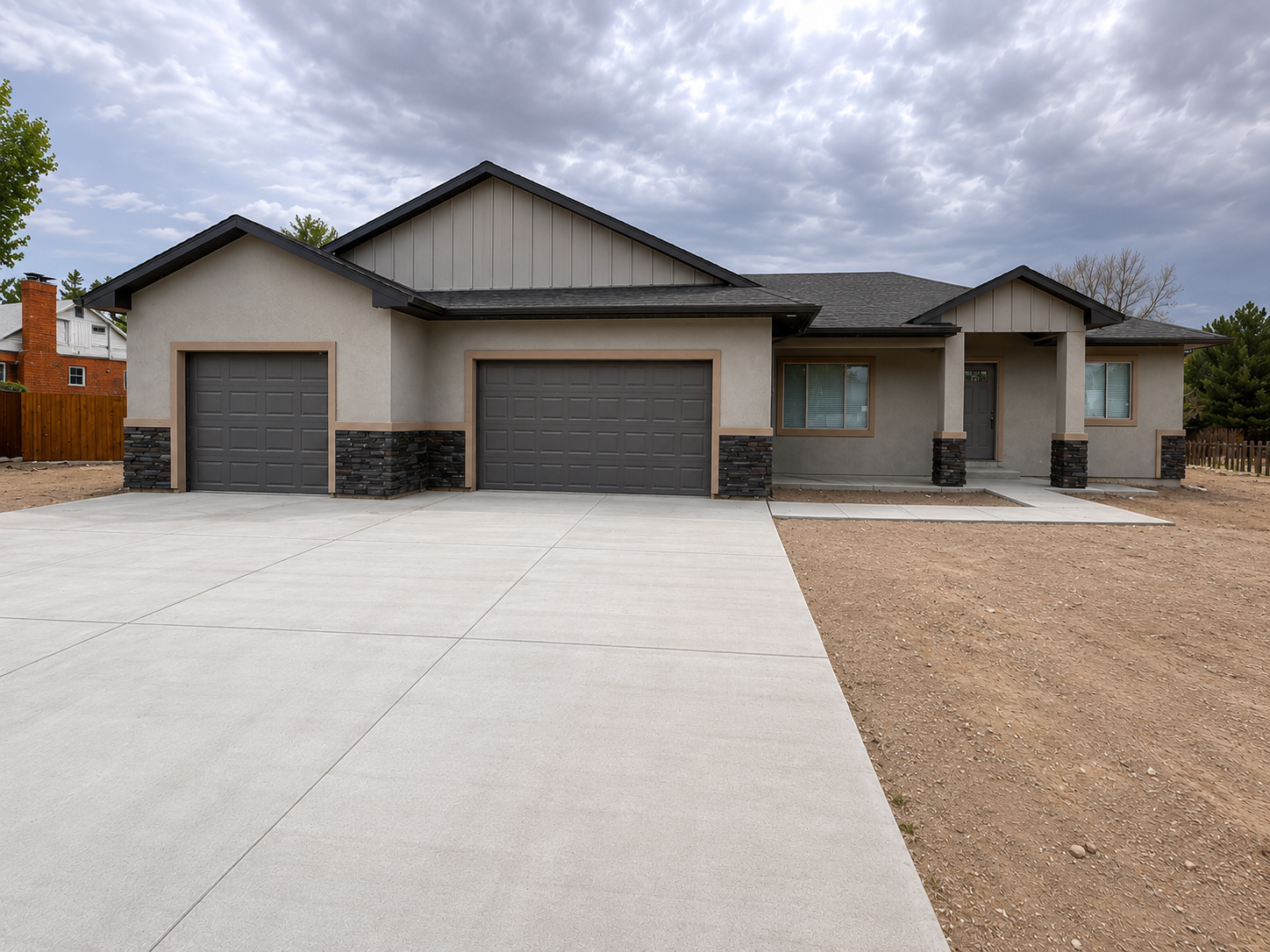 New Construction Ranch Home, Grey with brown popouts and dark garage doors
