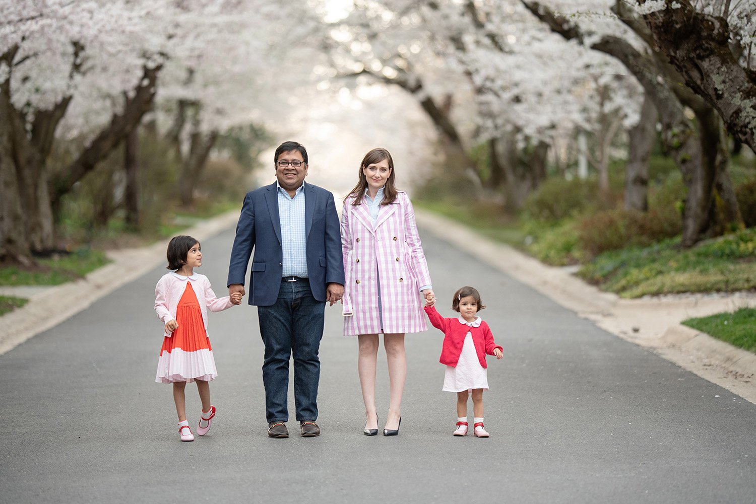family in cherry blossom photography