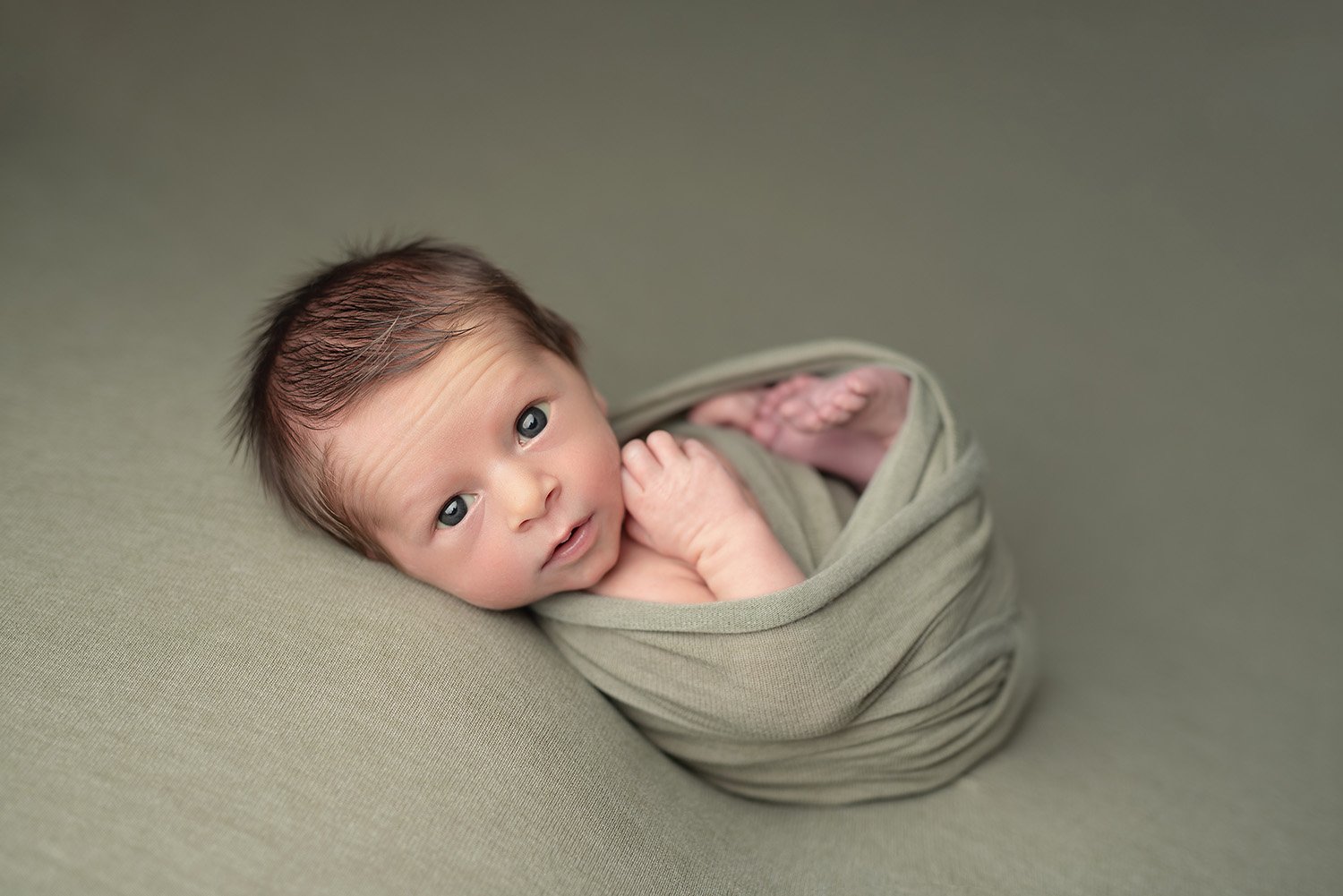 awake posed newborn