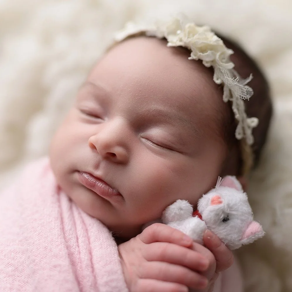 baby girl in pink
