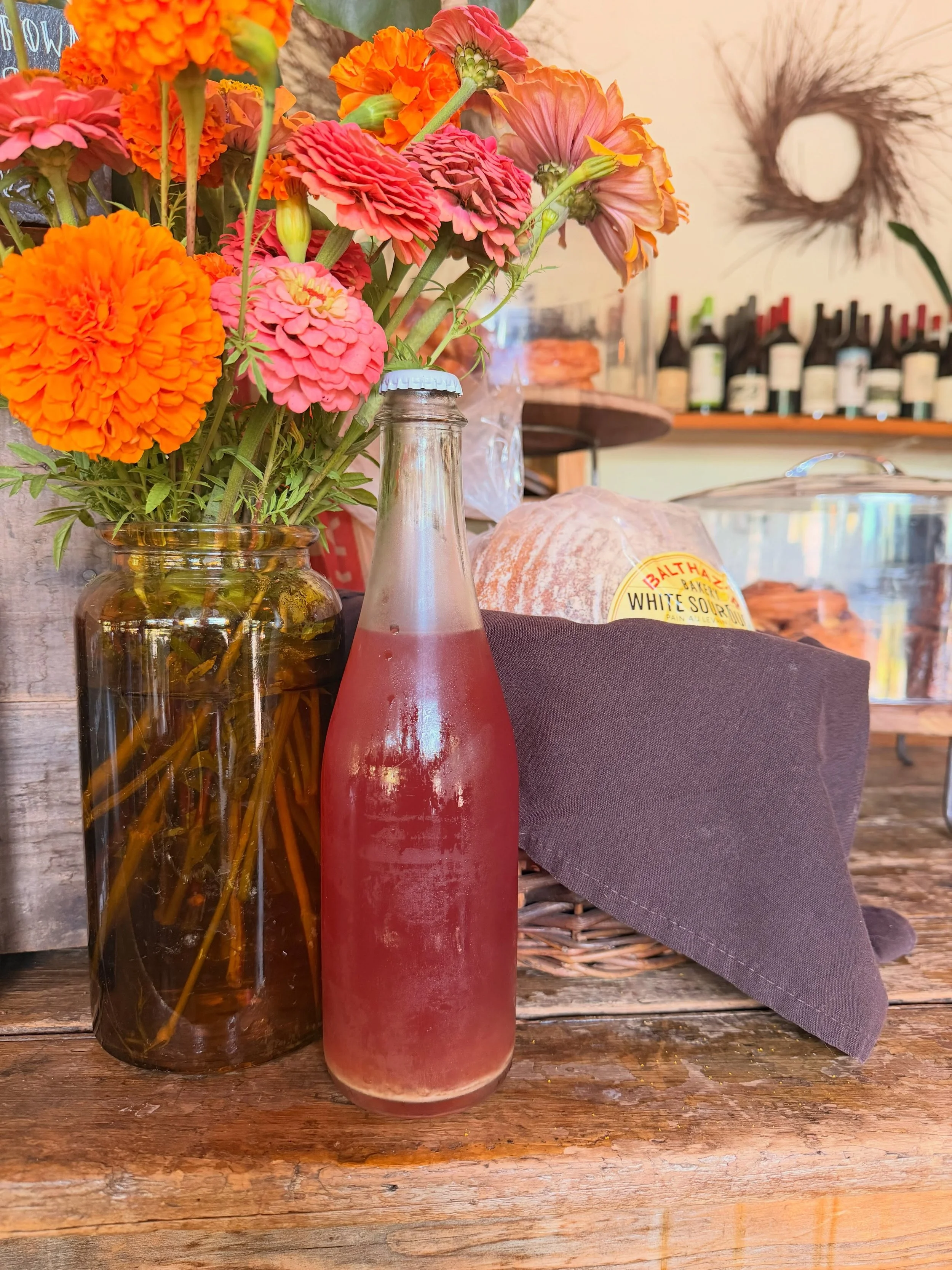 Ice cold Elderberry + Lemon Verbena for your next trip to the farm stand: Yerbera kombucha is stocked at Blooming Hill Farm. 🌿