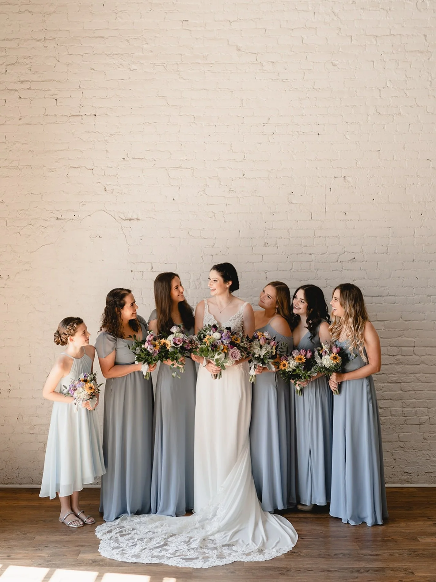 A moment with her crew. 

planner @blueeventsandco 
bar @aetreventstx 
catering @pej_events 
floral @wowfactorfloraldesign 
photography @katekenyonphoto 
rentals Marquee Event Group