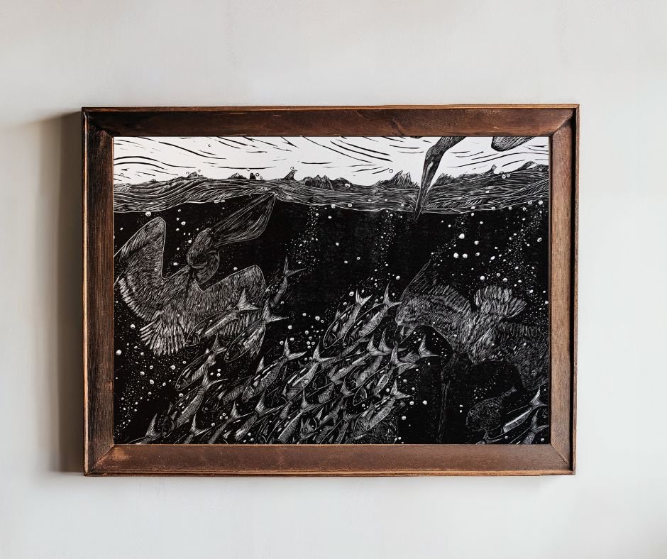 brown pelican artwork in walnut frame