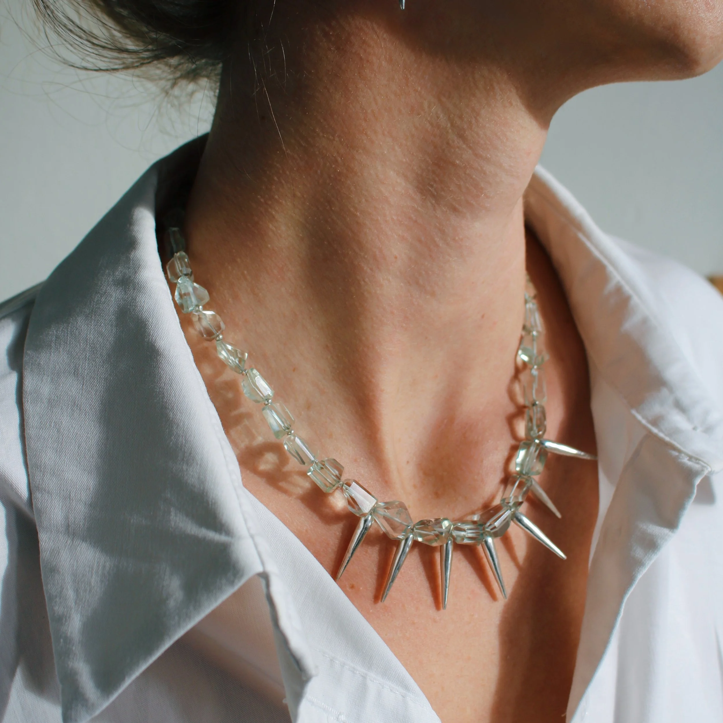 Take a walk on the wild side with this seafoam minty Prasiolite Spike Necklace. Prasiolite is green quartz, also known as green amethyst. These stones are softly transparent, roughly hewn, and highly polished to bring you the perfect balance of rugge