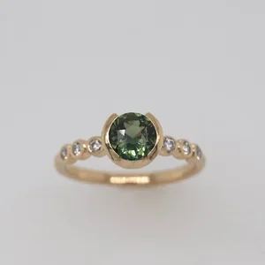Sapphire+pleiades+solitaire.webp