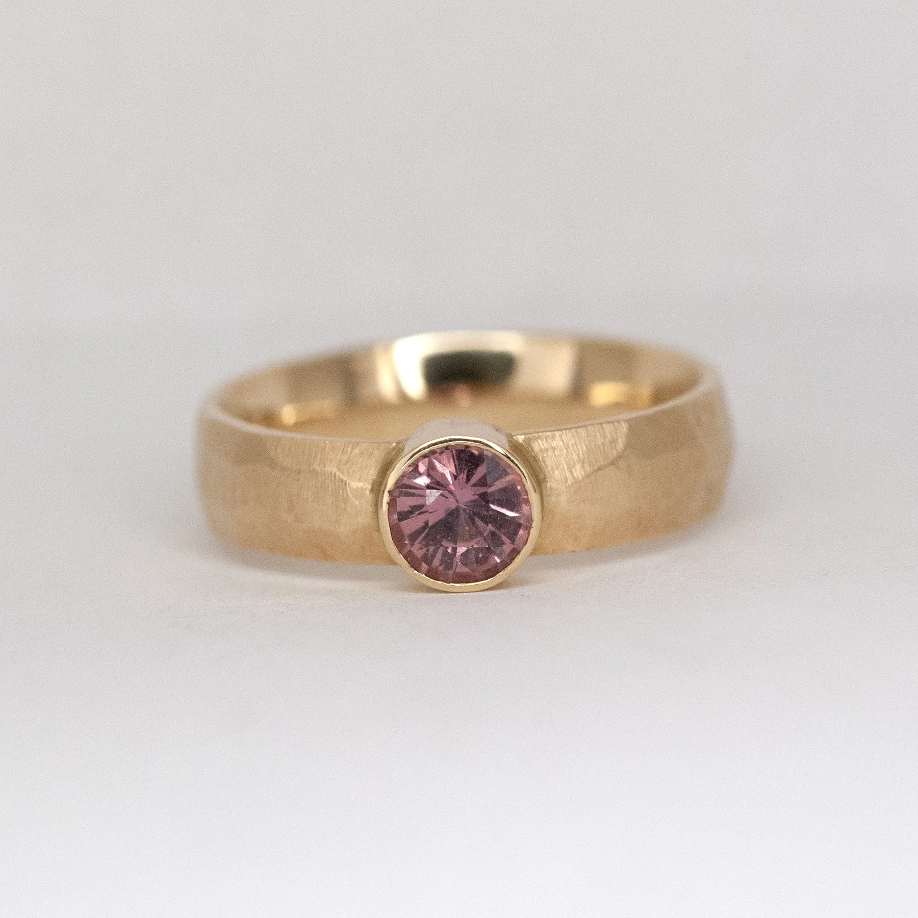Dusty Rose Sapphire Hewn Band Solitaire