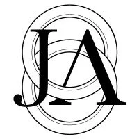 Stylized logo with overlapping circles and the letters J and A in a modern design.