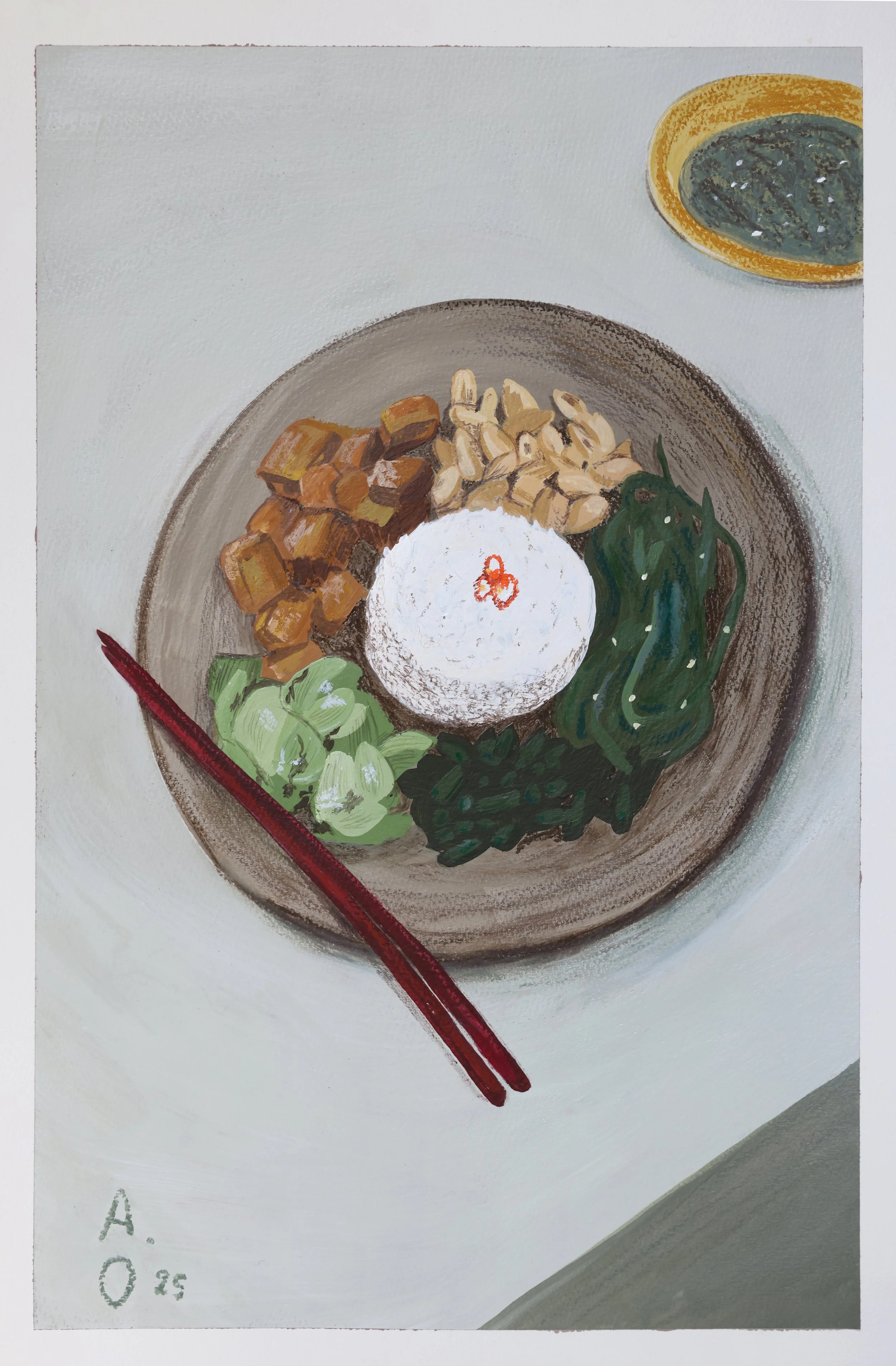 A plate of bibimbap with rice, vegetables, and tofu, with a small bowl of sauce on the side, and red chopsticks resting on the edge of the plate.