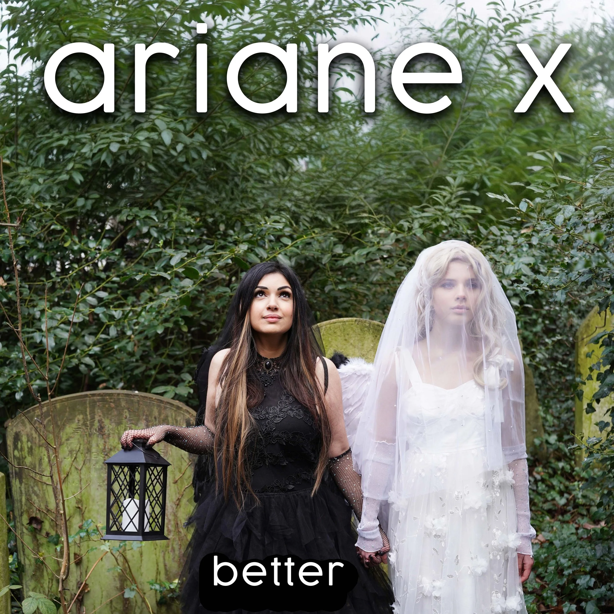 Ariane X with her daughter in a graveyard. She is wearing a black dress and veil and her daughter is wearing a white dress, veil and angel wings