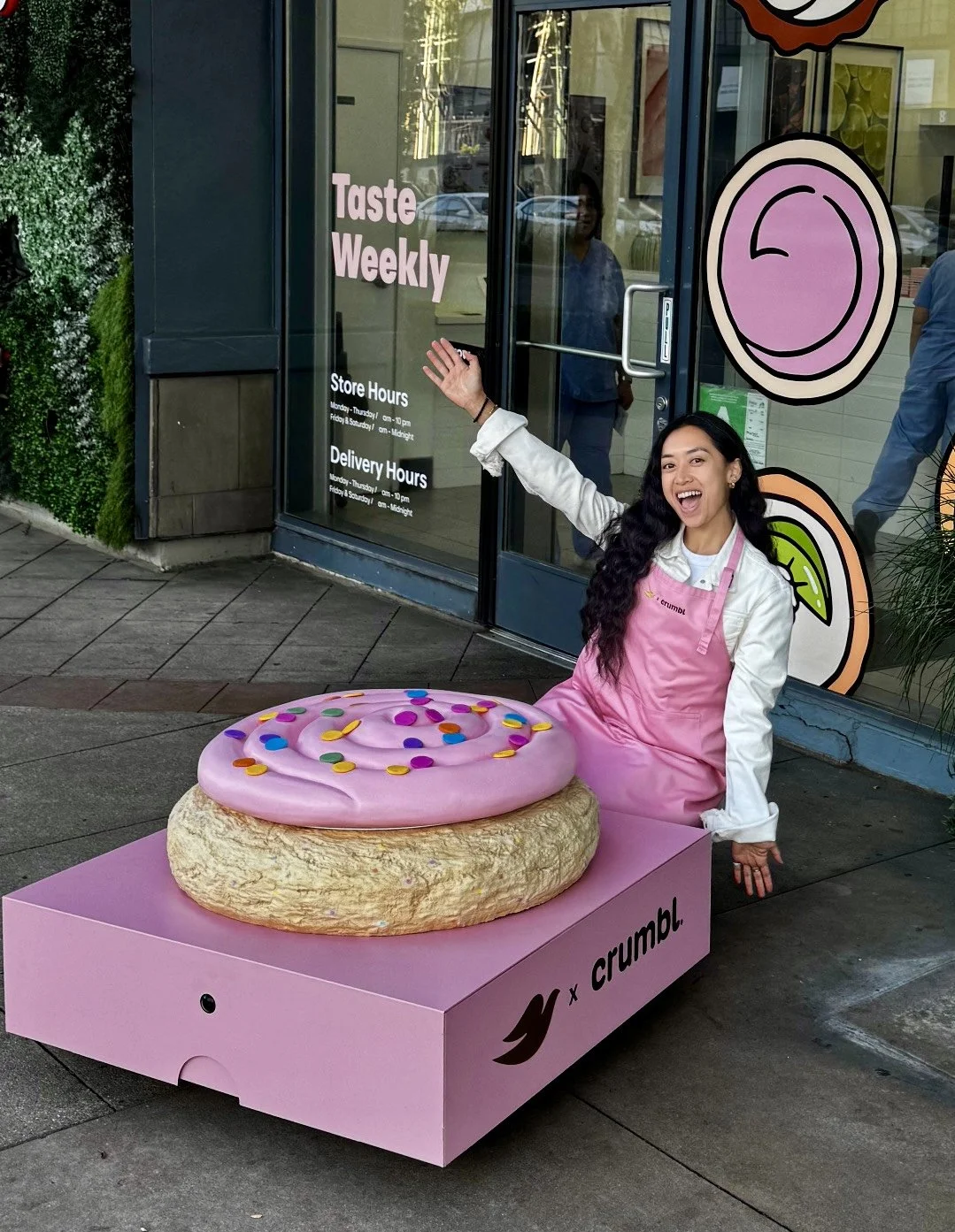 Brand Ambassador serving crumbl cookies