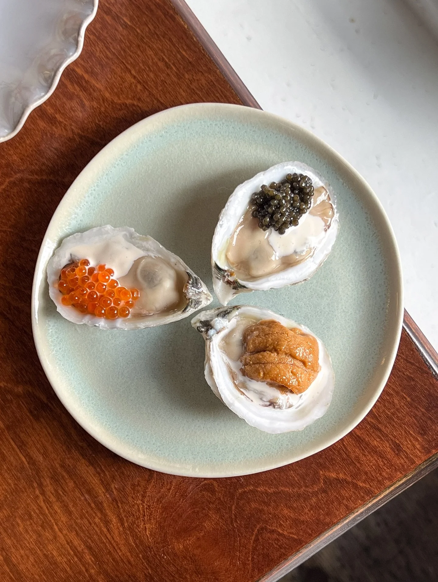 Oyster’s dressed in smoked trout roe, caviar, or Maine uni. Which are you choosing?