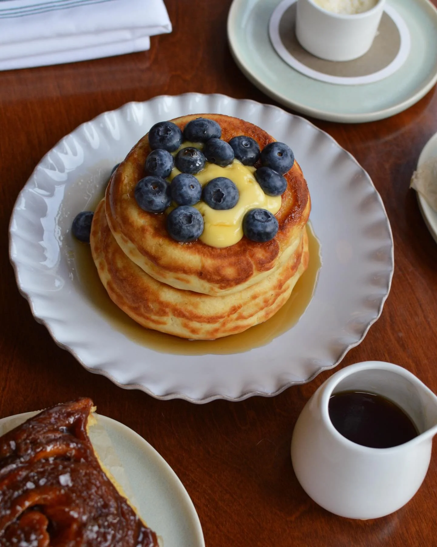 Brunch every Sunday! LW short stack..buttermilk pancakes topped with blueberries, smoked maple and curd. Add caviar!