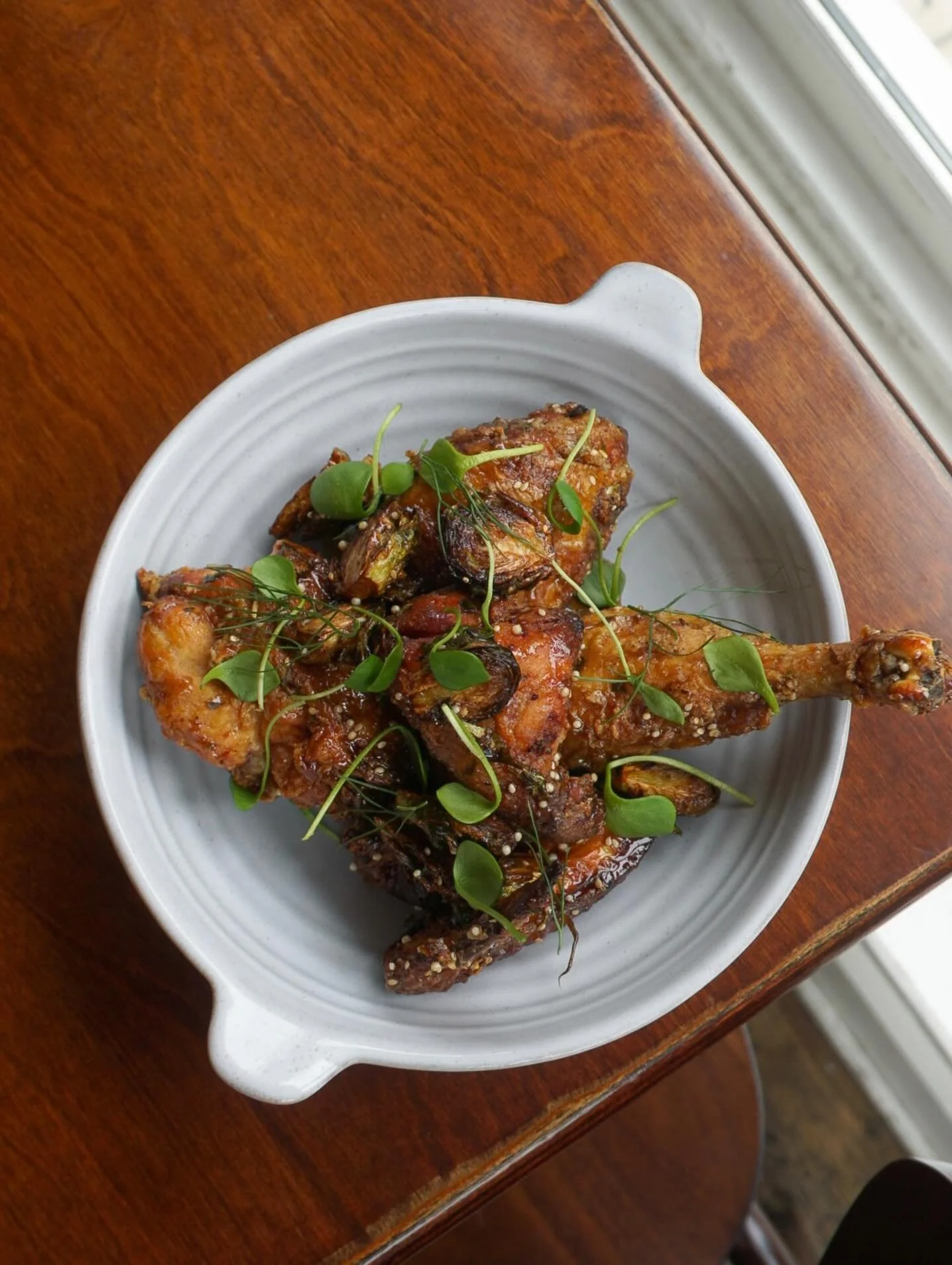 New spring chicken! Lancaster Co. chicken with savory caramel, fried brussels and benne, glazed and fried so good it will make you MAD!!