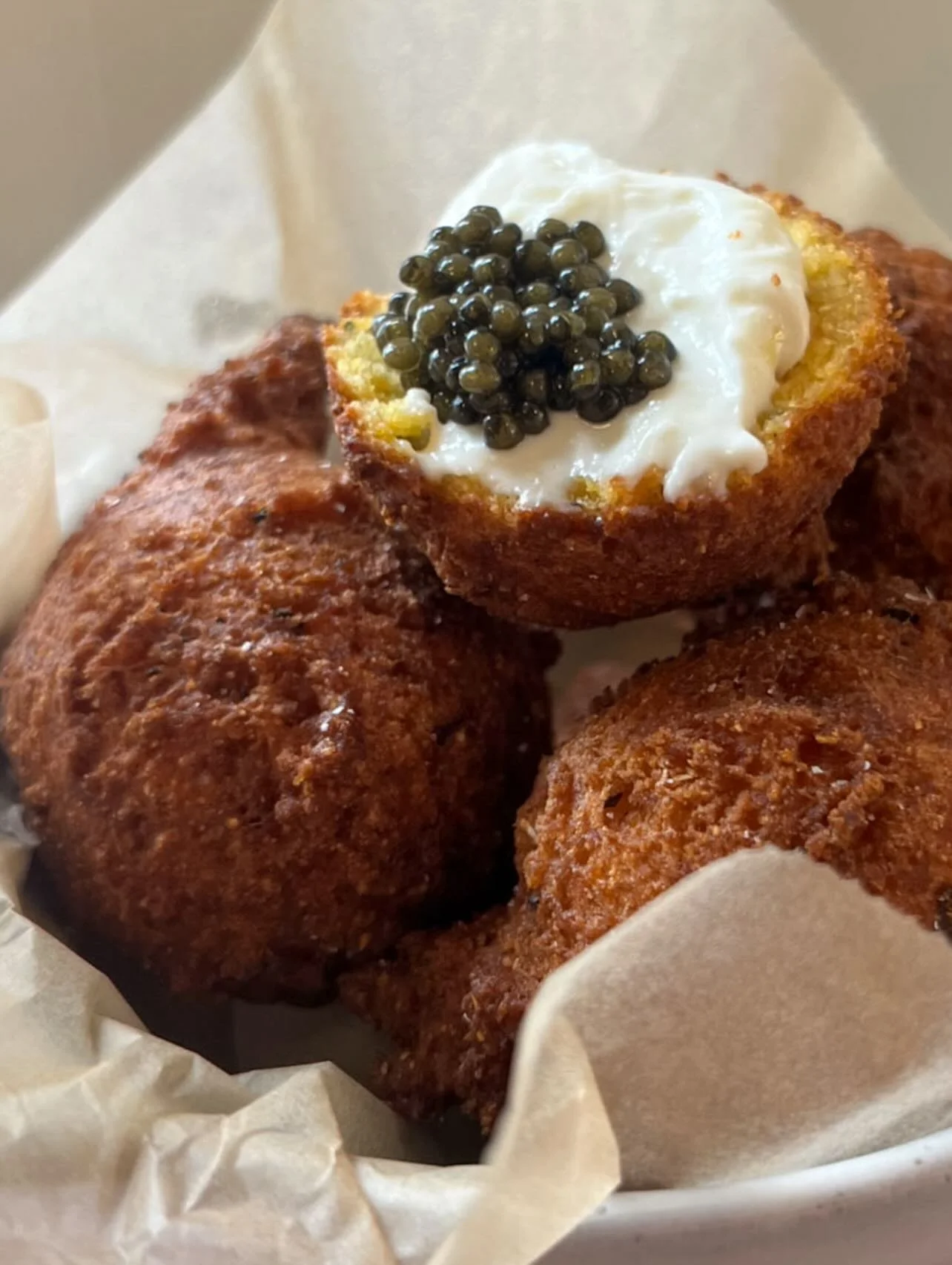 Caviar service for the table, hushpuppies, ricotta and lemon oil served with a chef&rsquo;s ounce of golden ossetra caviar. See you at five!