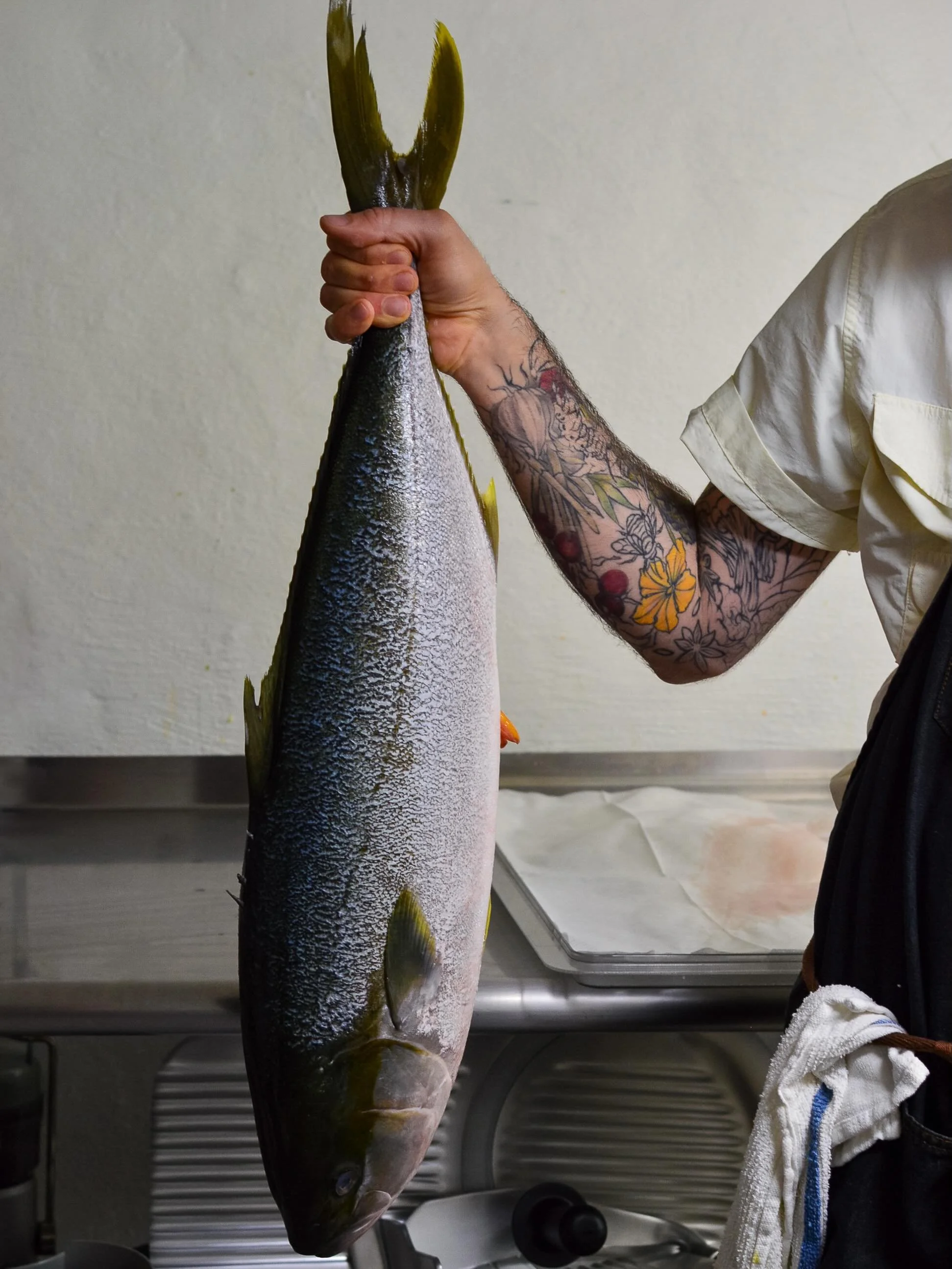 Sustainably sourced from New Zealand, raw hiramasa served with first of the season tomatoes, fermented chili and sorrel.