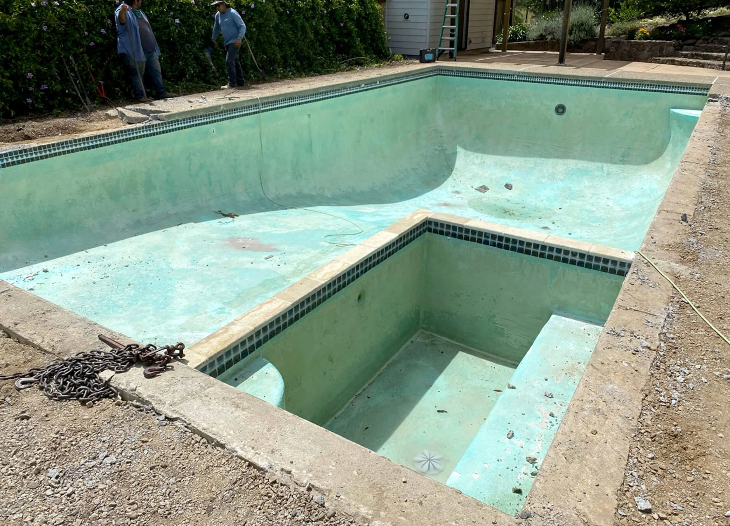 Image of drained residential pool prior to resurfacing.