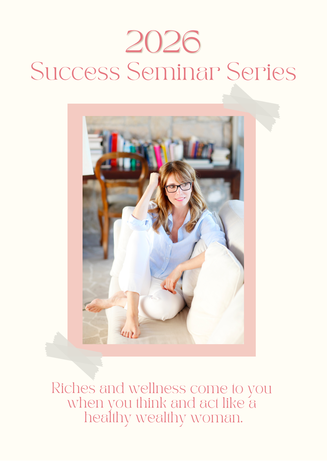 A woman with red hair, glasses, and casual clothing sitting on a beige couch, raising her right arm behind her head, in a cozy room with a brick wall, a wooden chair, and a bookshelf in the background.