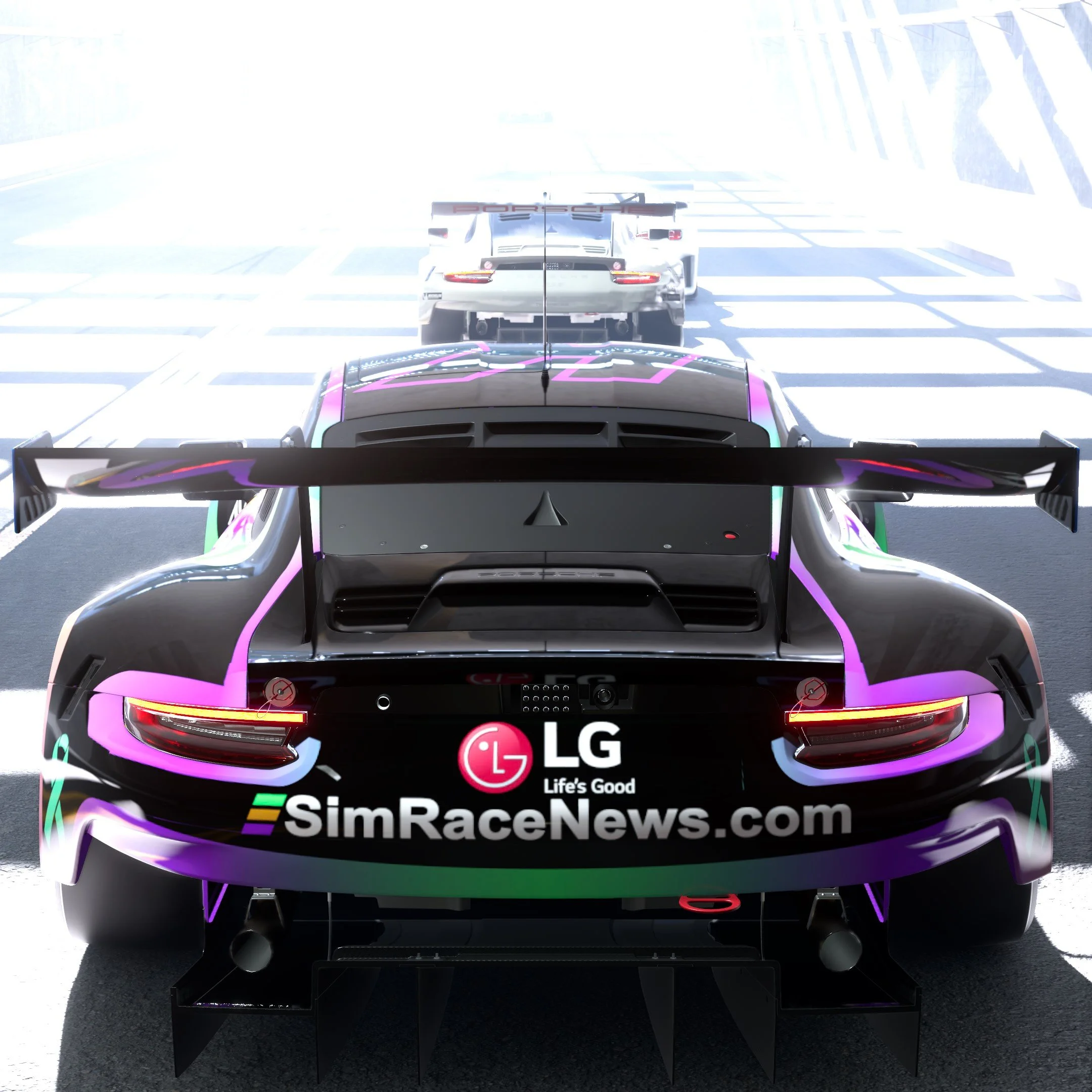 Rear view of a black racing car with colorful lights and sponsorship logos, including LG, on a race track with another race car ahead.