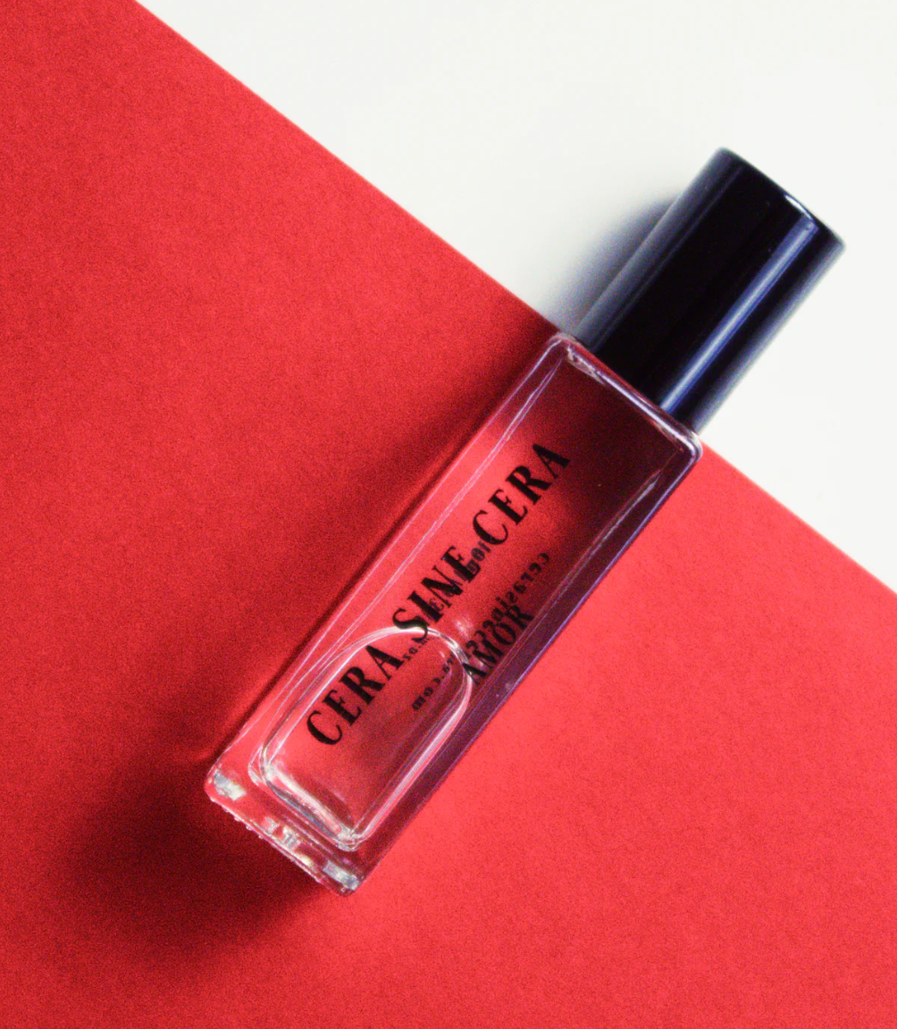 Luxury roll-on perfume oil for clean beauty routine, shown with manicured nails. Non-toxic fragrance for Japanese Gel Manicure nail salon clients, hand care, and everyday beauty like Mellow Bar.