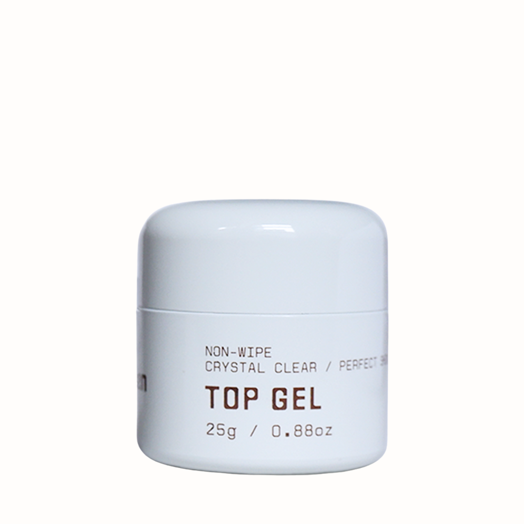 We seal every nail set with the By En Top Gel, a non-wipe and crystal clear finishing gel designed for durability and shine. This HEMA-free and TPO-free formula ensures a safer option for clients with sensitivities while delivering a long-lasting fin