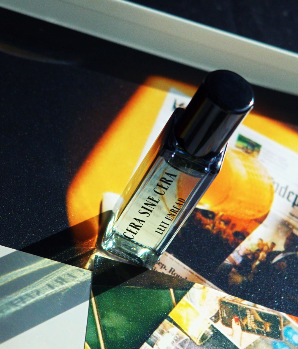 Luxury roll-on perfume oil for clean beauty routine, shown with manicured nails. Non-toxic fragrance for Japanese Gel Manicure nail salon clients, hand care, and everyday beauty like Mellow Bar.