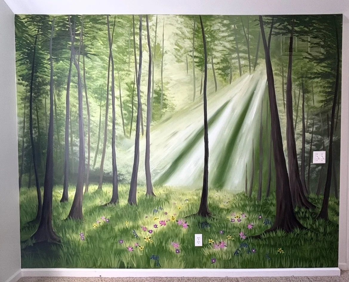 I love transforming spaces with large scale artwork. It enhances the way you feel, work, and live in a space with a design created specifically for you. 

This forest scene went up on a 8x10 ft wall. With the gentle sunbeams peeking through a quiet f