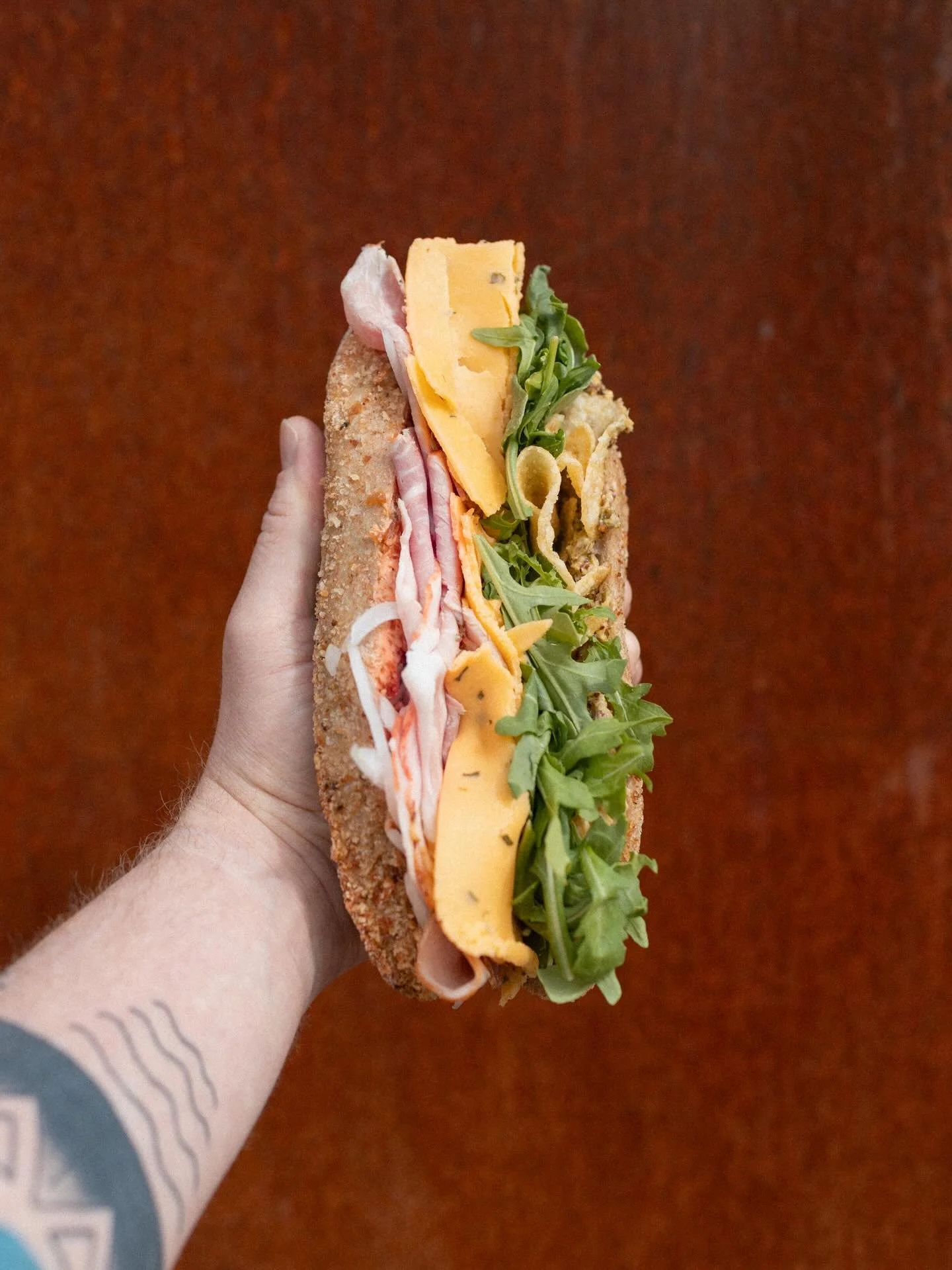 a ploughman&rsquo;s lunch

rosemary ham with cotswold, housemade branston&rsquo;s butter, cornichon mustard, arugula, and salt + vin potato chips on a soft wheat country roll

something to improve your spring days toiling in the fields of life, from 