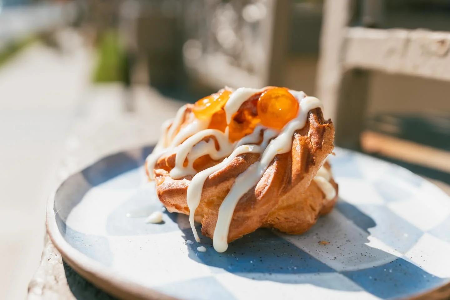 orange creamsicle puff with candied kumquat