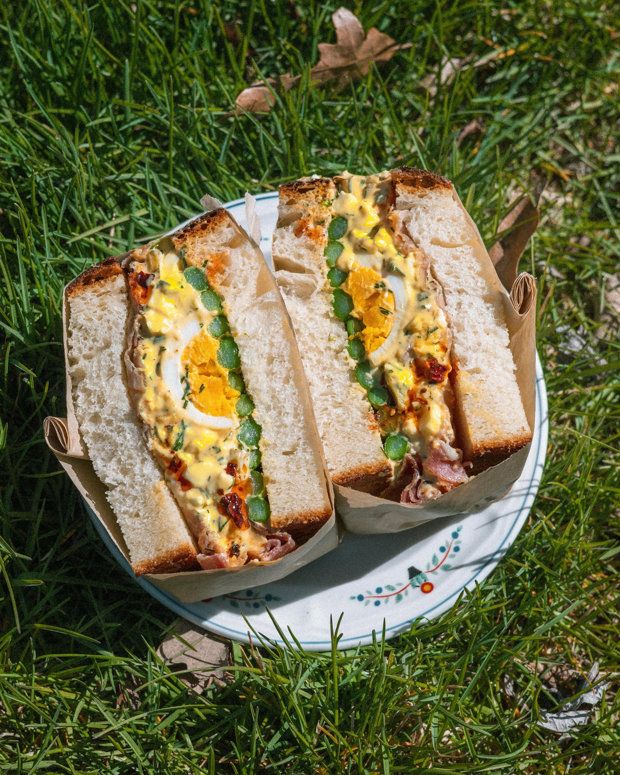 egg salad made with al&rsquo;s neighbor&rsquo;s eggs
asparagus from @seedlingfruit 
country ham from @bentonsbacon 
shokupan from @bakeryinthewoods 

the ham of god is back this week