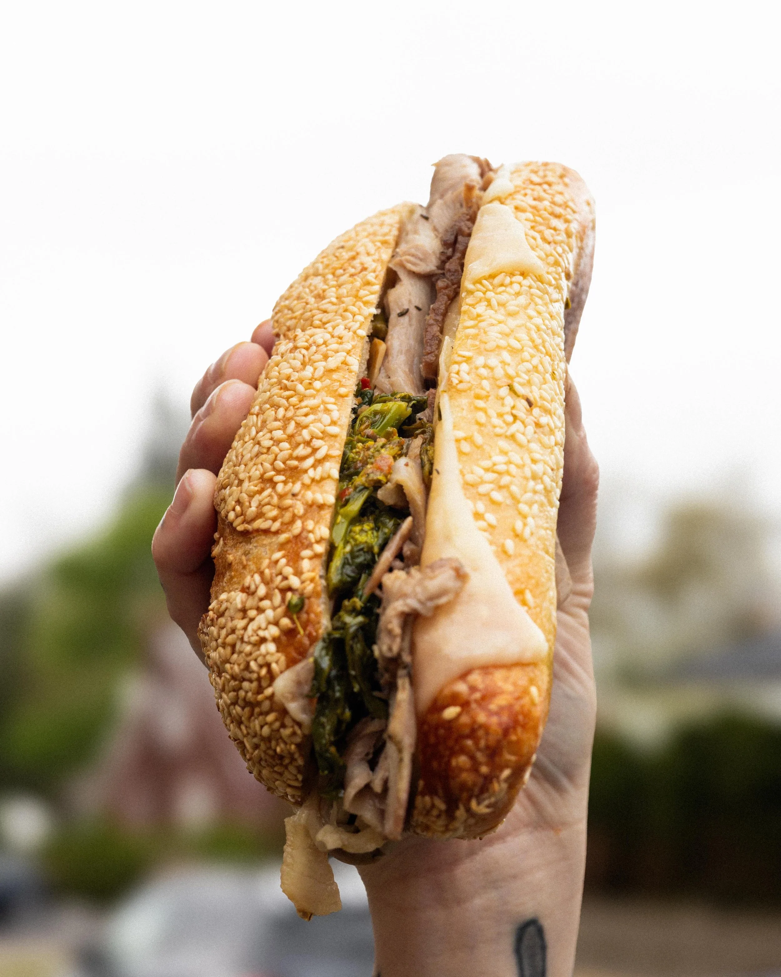 back this week with philadelphia roast pork and rapini sandwiches

roasted pork shoulder with braised rapini, aged provolone, and calabrian chiles on a sesame semolina hoagie 

new hours wed-fri 11-8 // sat 9-3