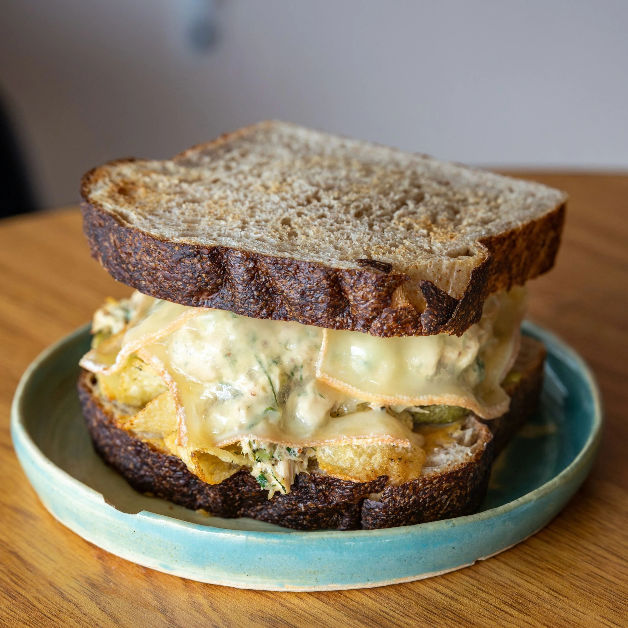 big tuna ii - our favorite tuna melt of all time is back on the menu

line caught tuna salad with lots of dill and celery, melted raclette, sweet n hot mustard, and dill pickle potato chips on toasted sourdough

open wednesday at 11