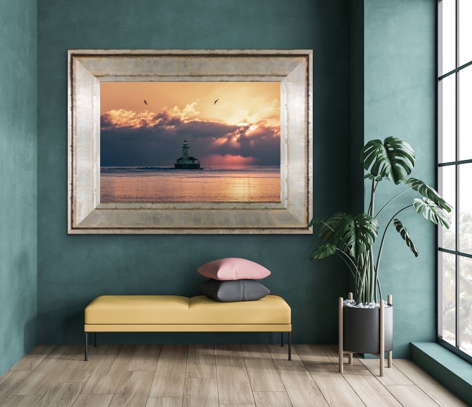 A serene sunset over a lighthouse with rays piercing through clouds and birds soaring in the sky.