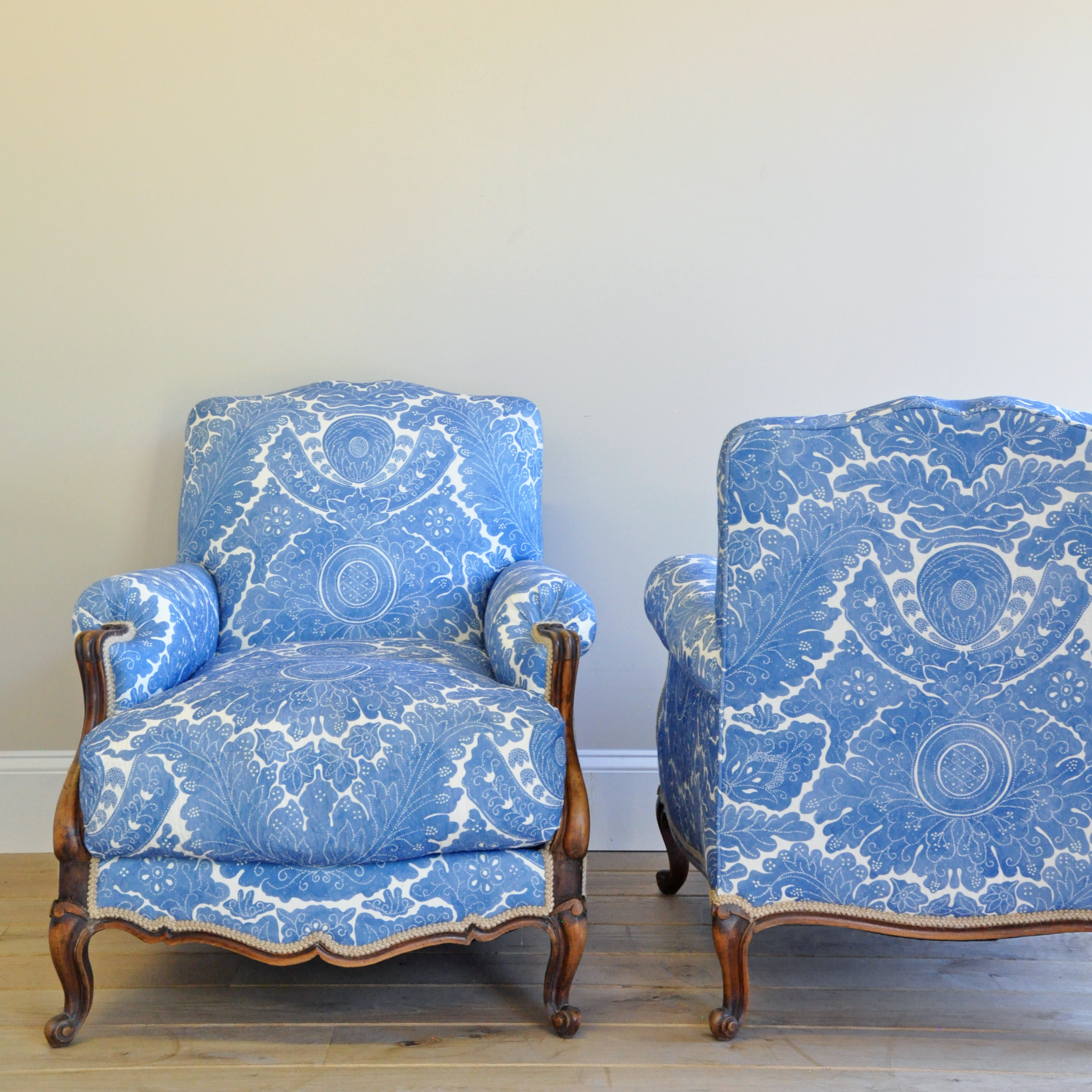 Pair of French Carved Fruitwood Bergères, Circa 1845–1870