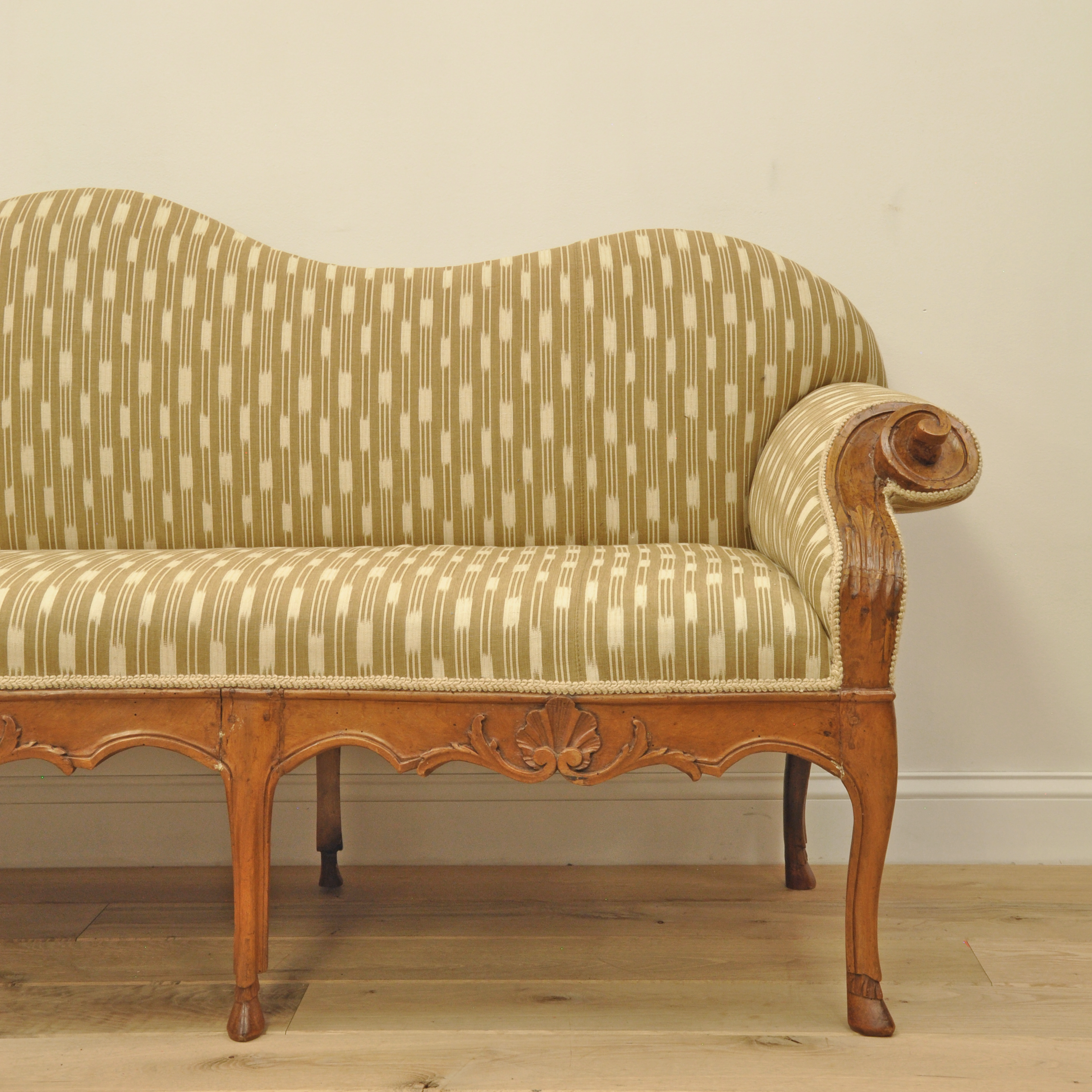 Northern Italian Walnut Sofa with Exceptional Carving, Circa 1750